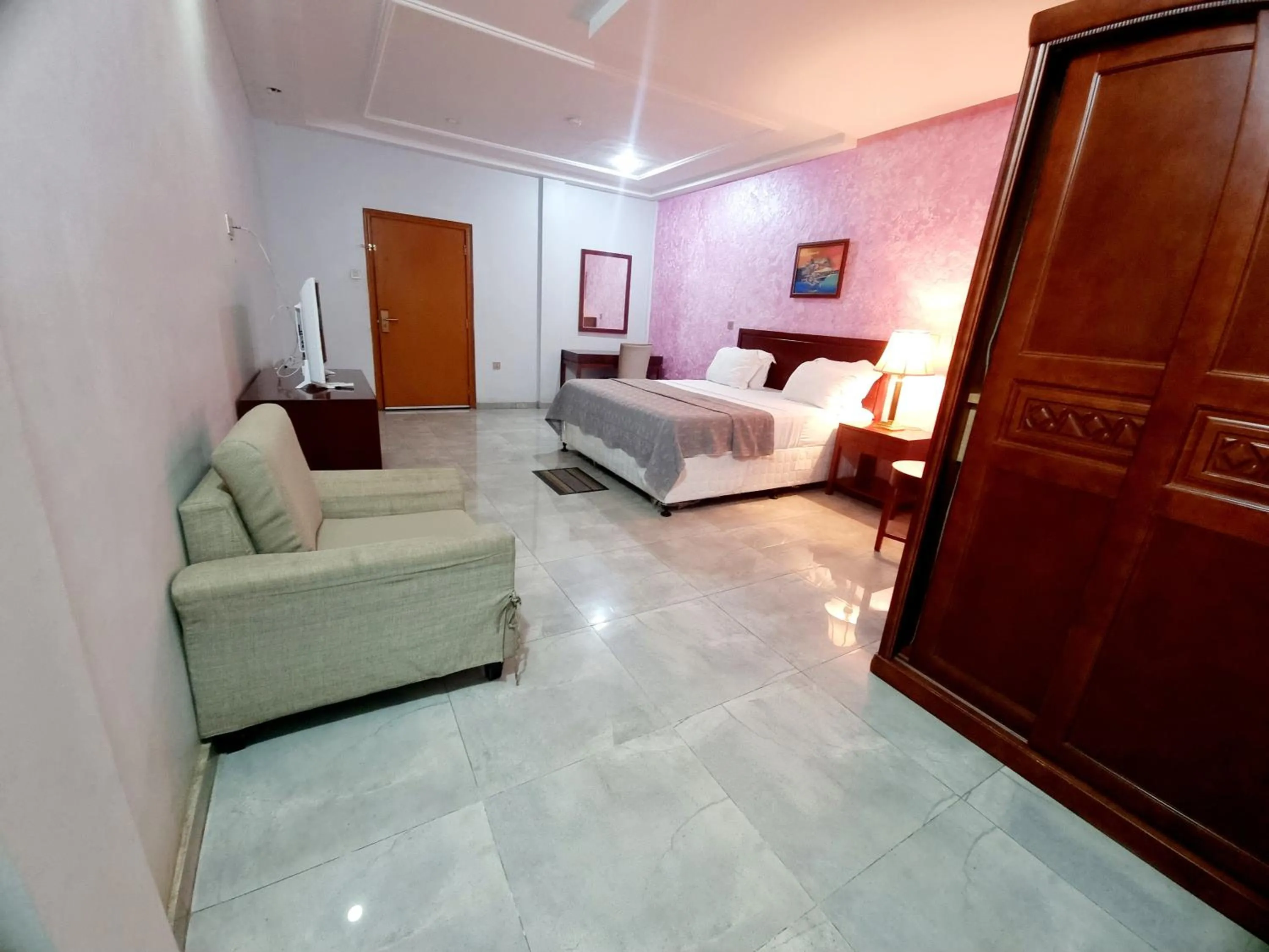 Bed in HOTEL AMBASSADORS ANNEXE