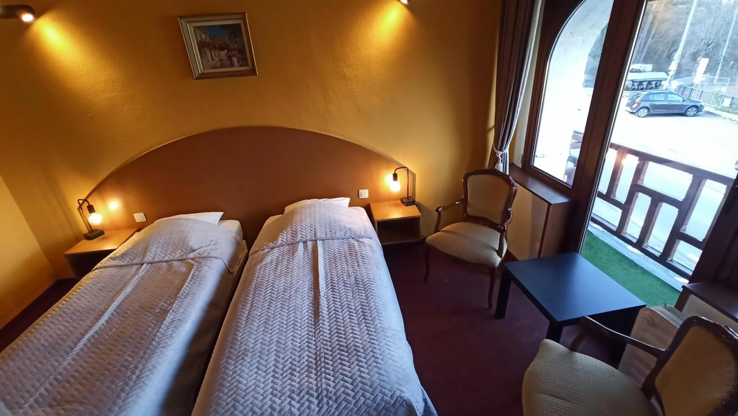 Bed in Hotel Le Chalet