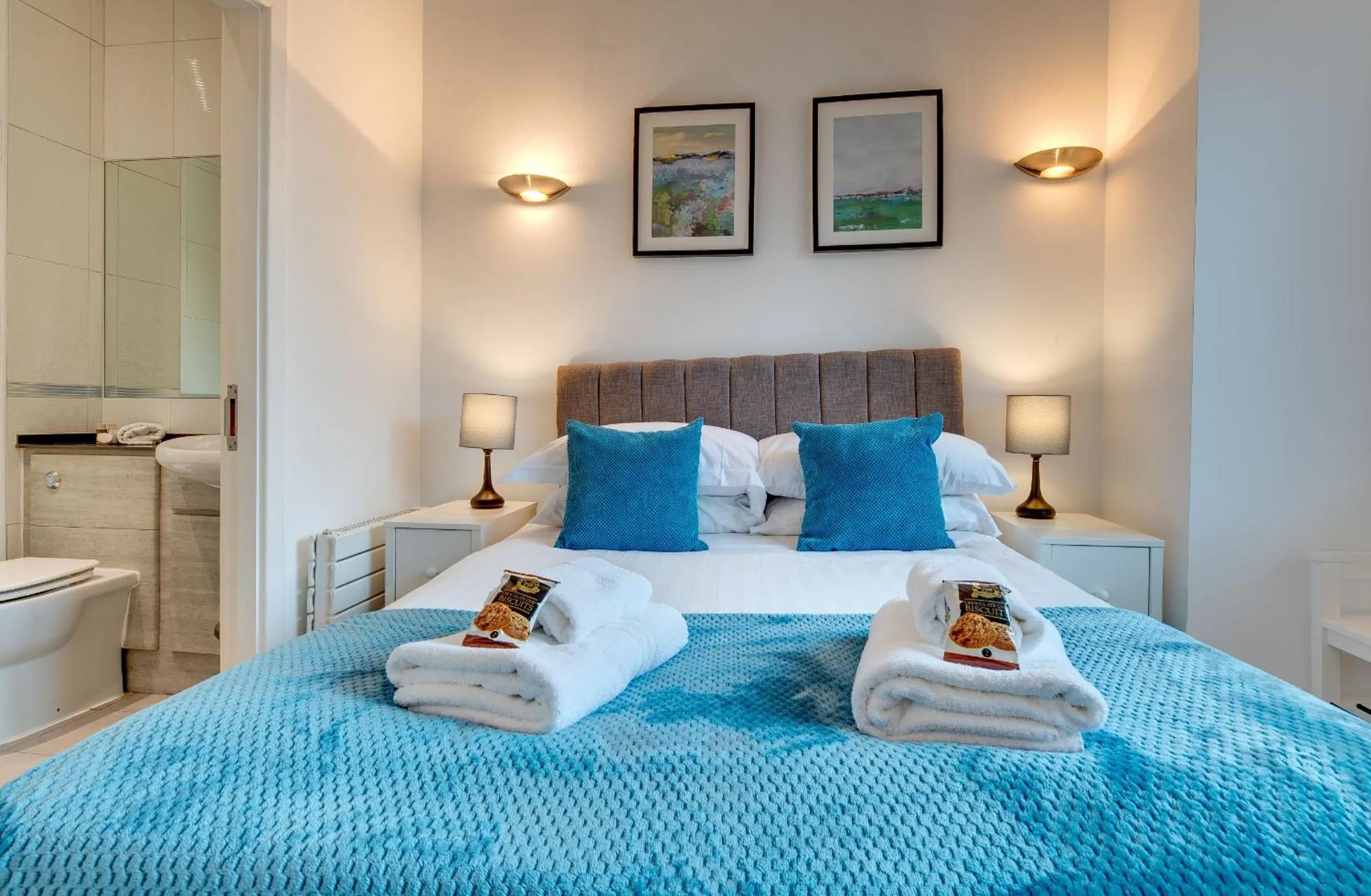 Bed in Crown Apartments 1C by Week2Week