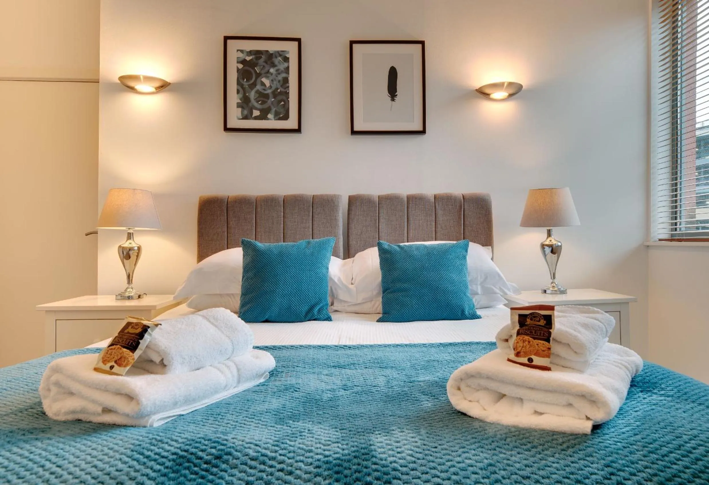 Bed in Crown Apartments 1C by Week2Week