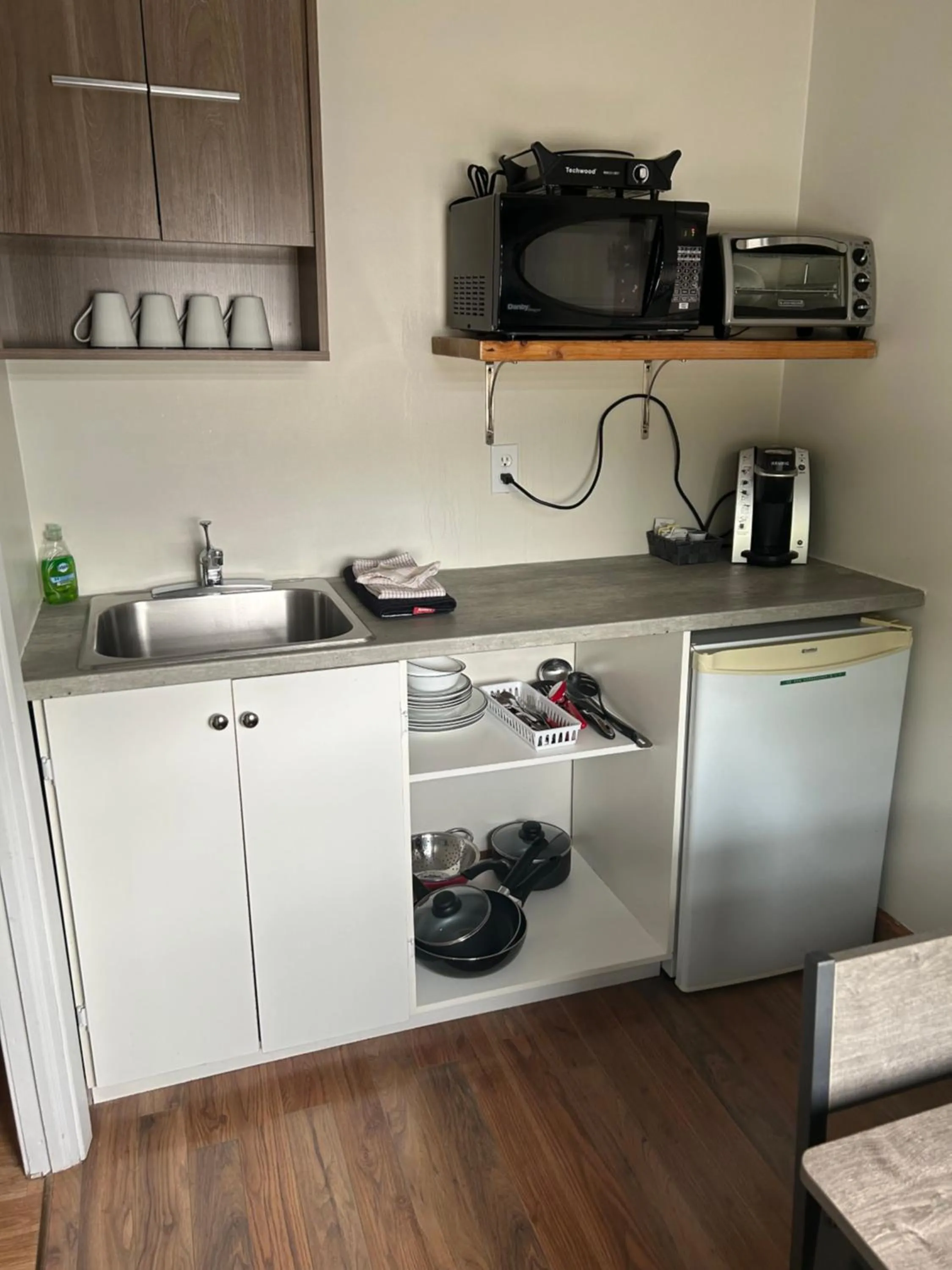 Kitchen or kitchenette in Motel de L'Anse et Camping Rimouski