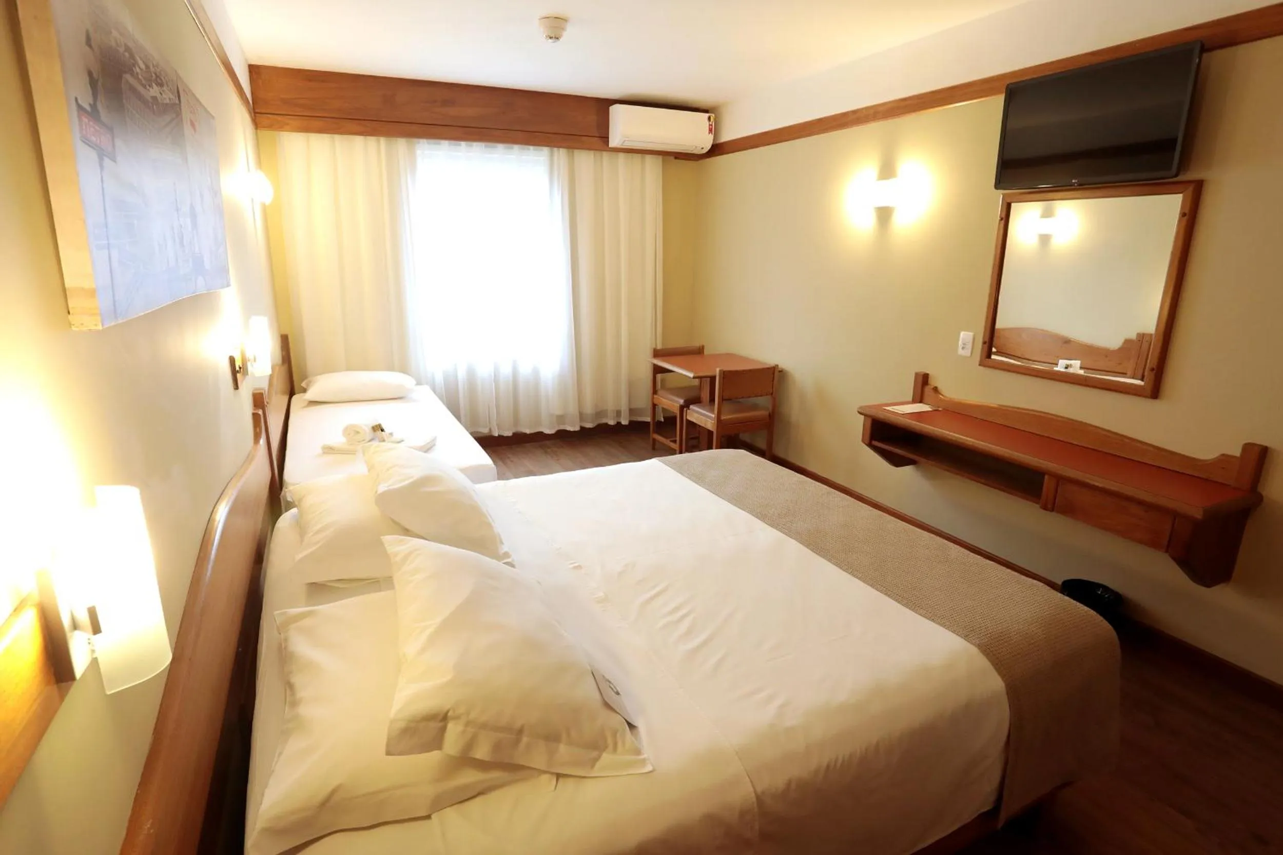 TV and multimedia, Bed in Tri Hotel