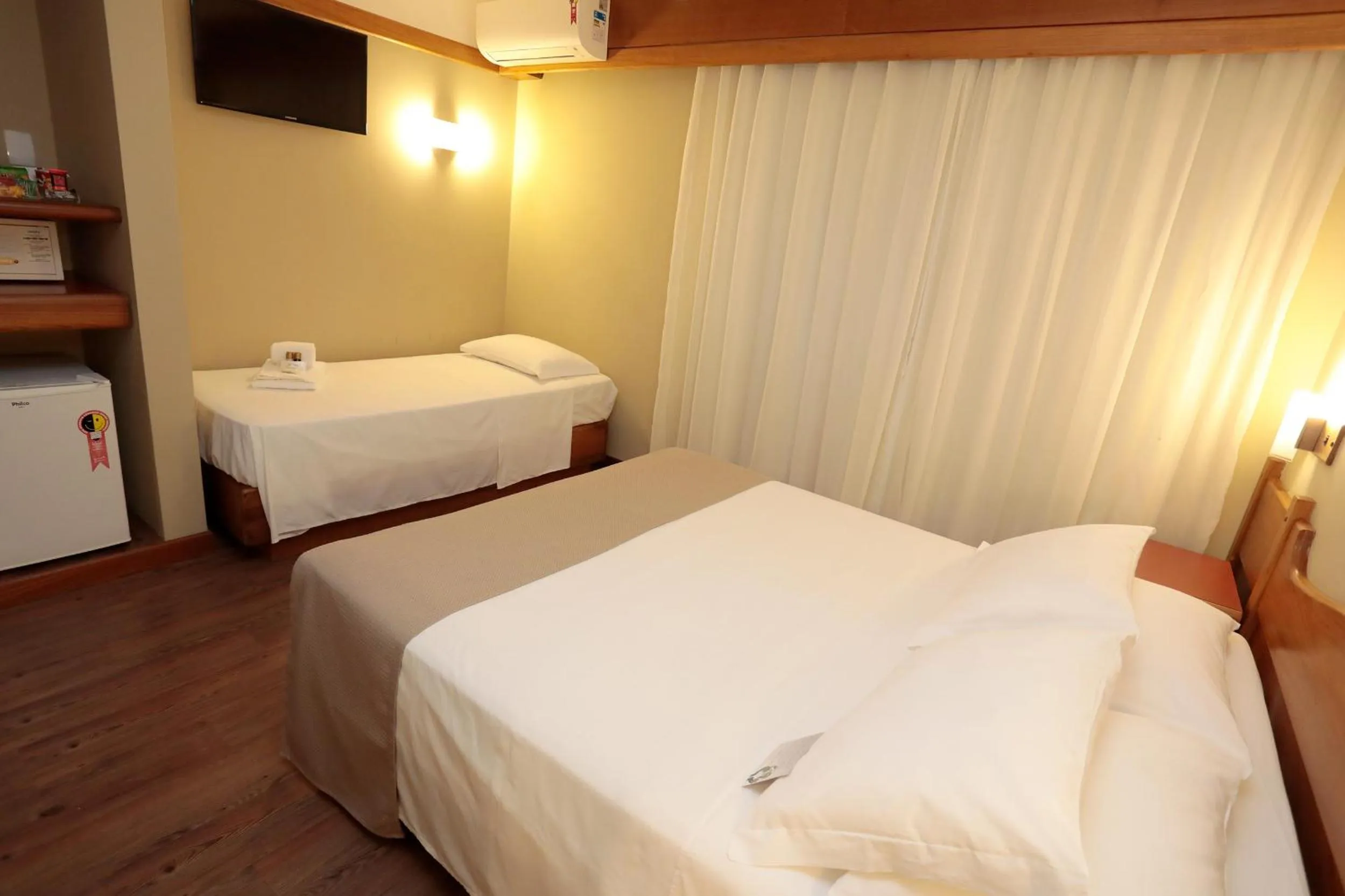 TV and multimedia, Bed in Tri Hotel