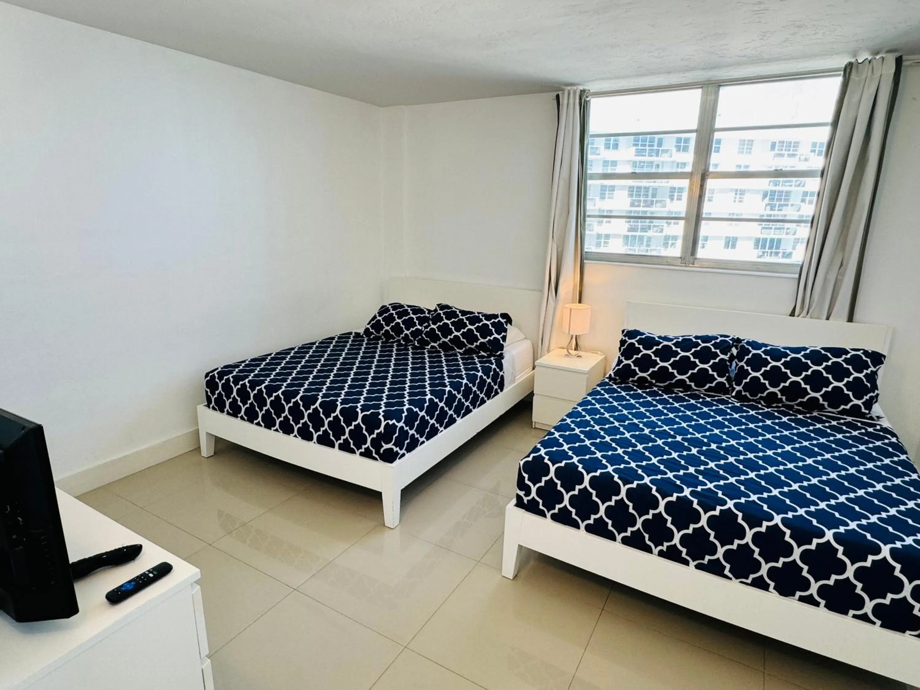 Bed in Miami Hallandale Condo, Partial Ocean View Direct Beach and Pool Access Miami Hollywood Beach