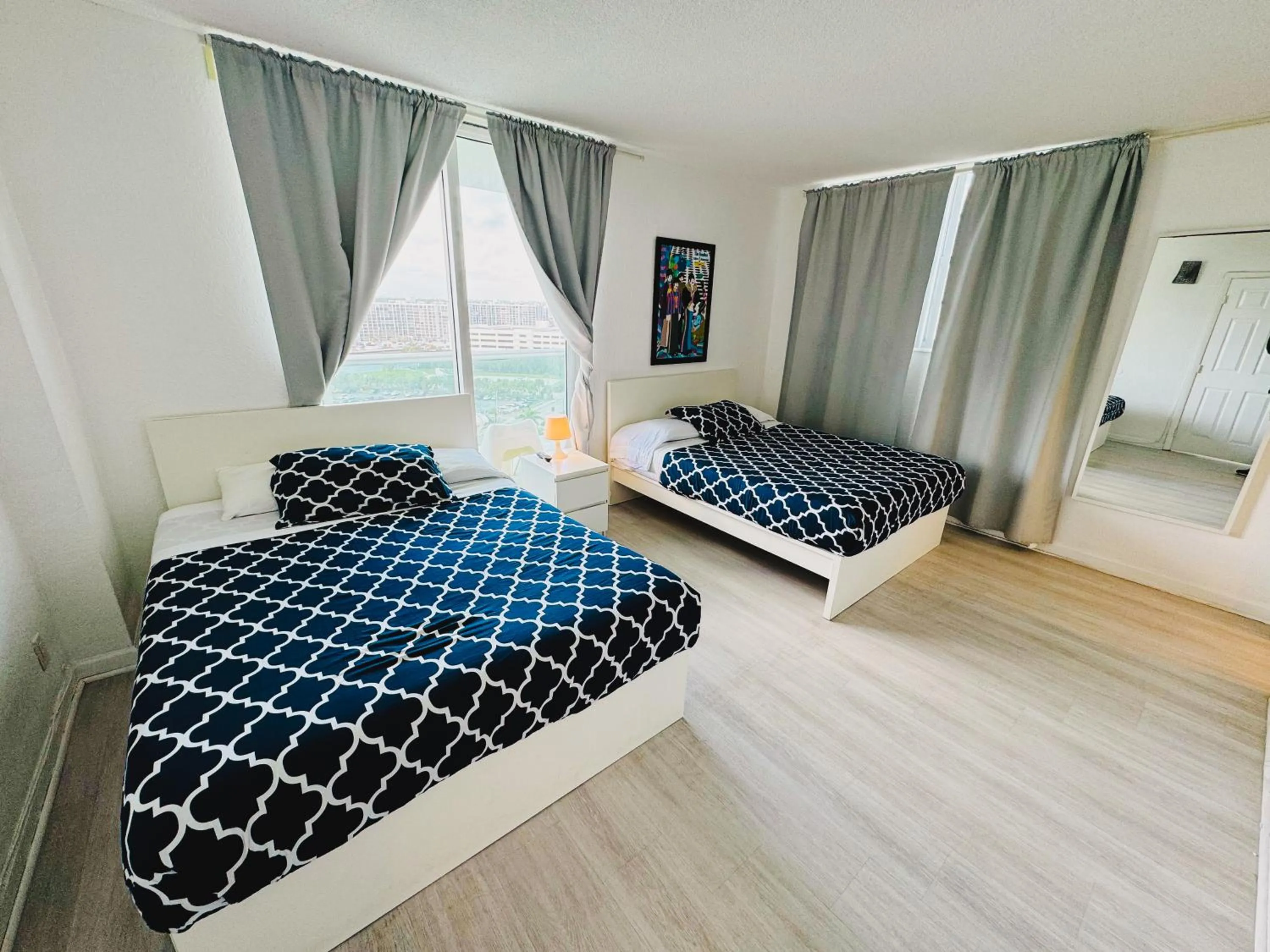 Bed in Miami Hallandale Condo, Partial Ocean View Direct Beach and Pool Access Miami Hollywood Beach