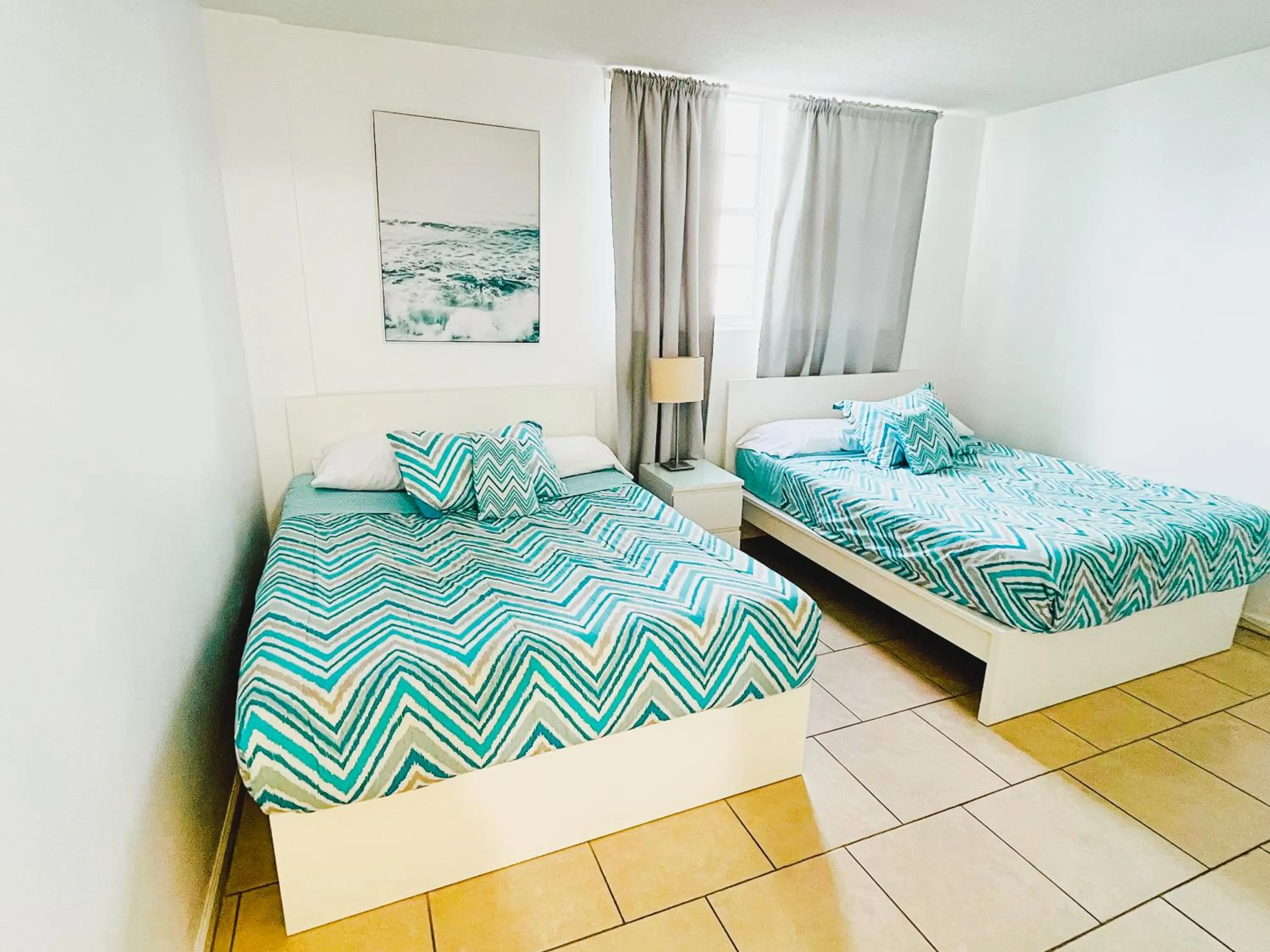 Bed in Miami Hallandale Condo, Partial Ocean View Direct Beach and Pool Access Miami Hollywood Beach