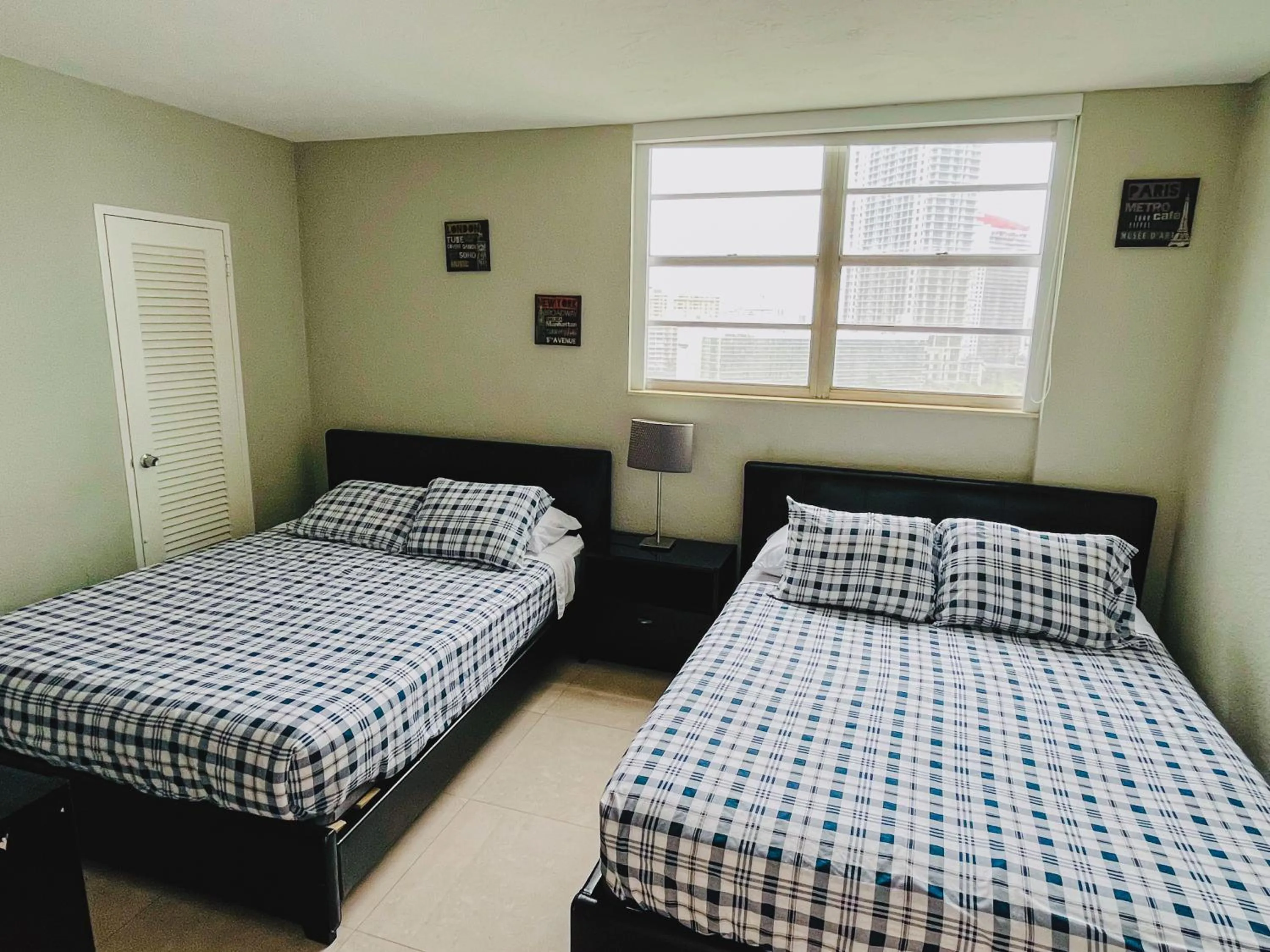 Bed in Miami Hallandale Condo, Partial Ocean View Direct Beach and Pool Access Miami Hollywood Beach