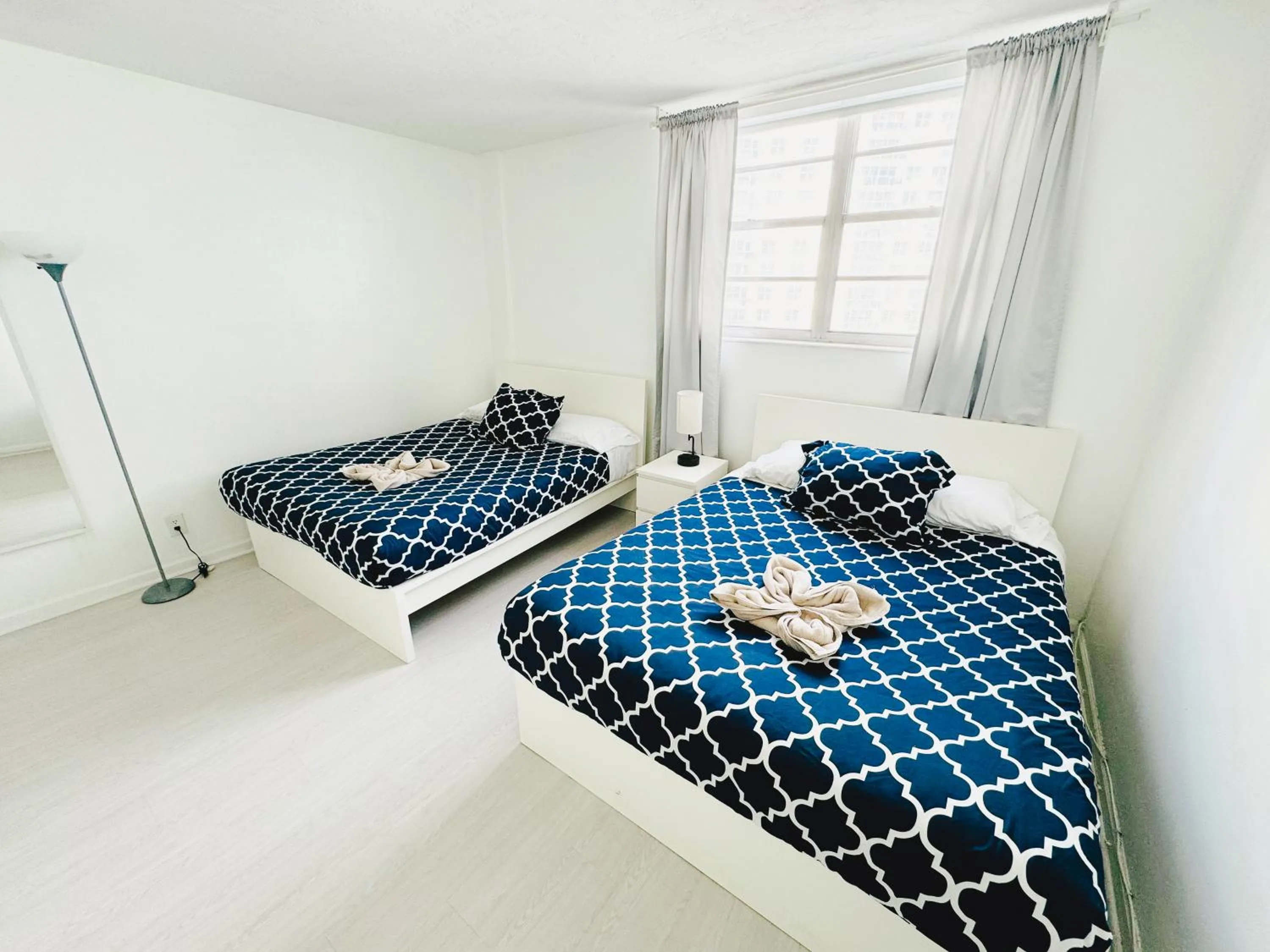 Bed in Miami Hallandale Condo, Partial Ocean View Direct Beach and Pool Access Miami Hollywood Beach