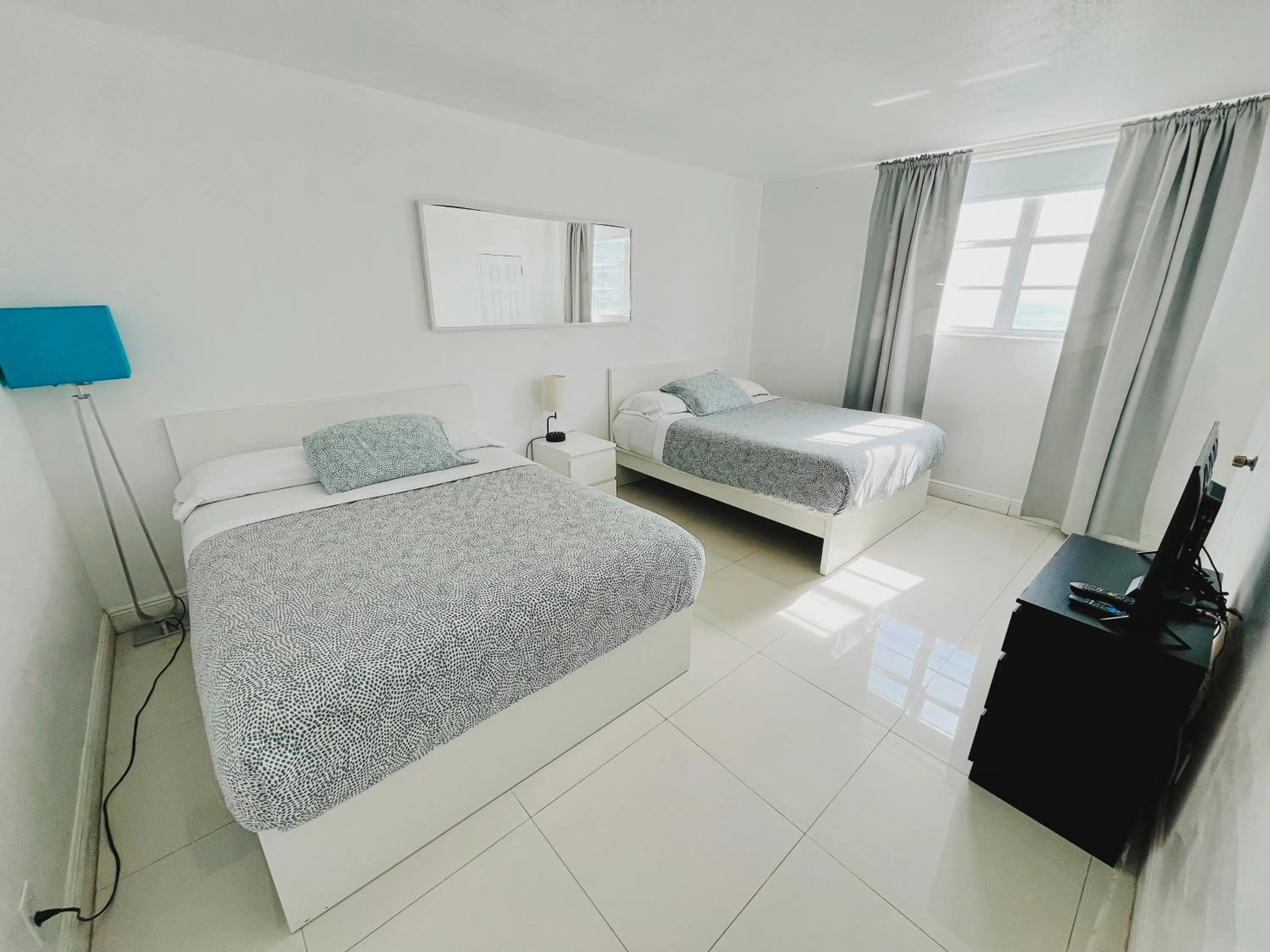 Bed in Miami Hallandale Condo, Partial Ocean View Direct Beach and Pool Access Miami Hollywood Beach