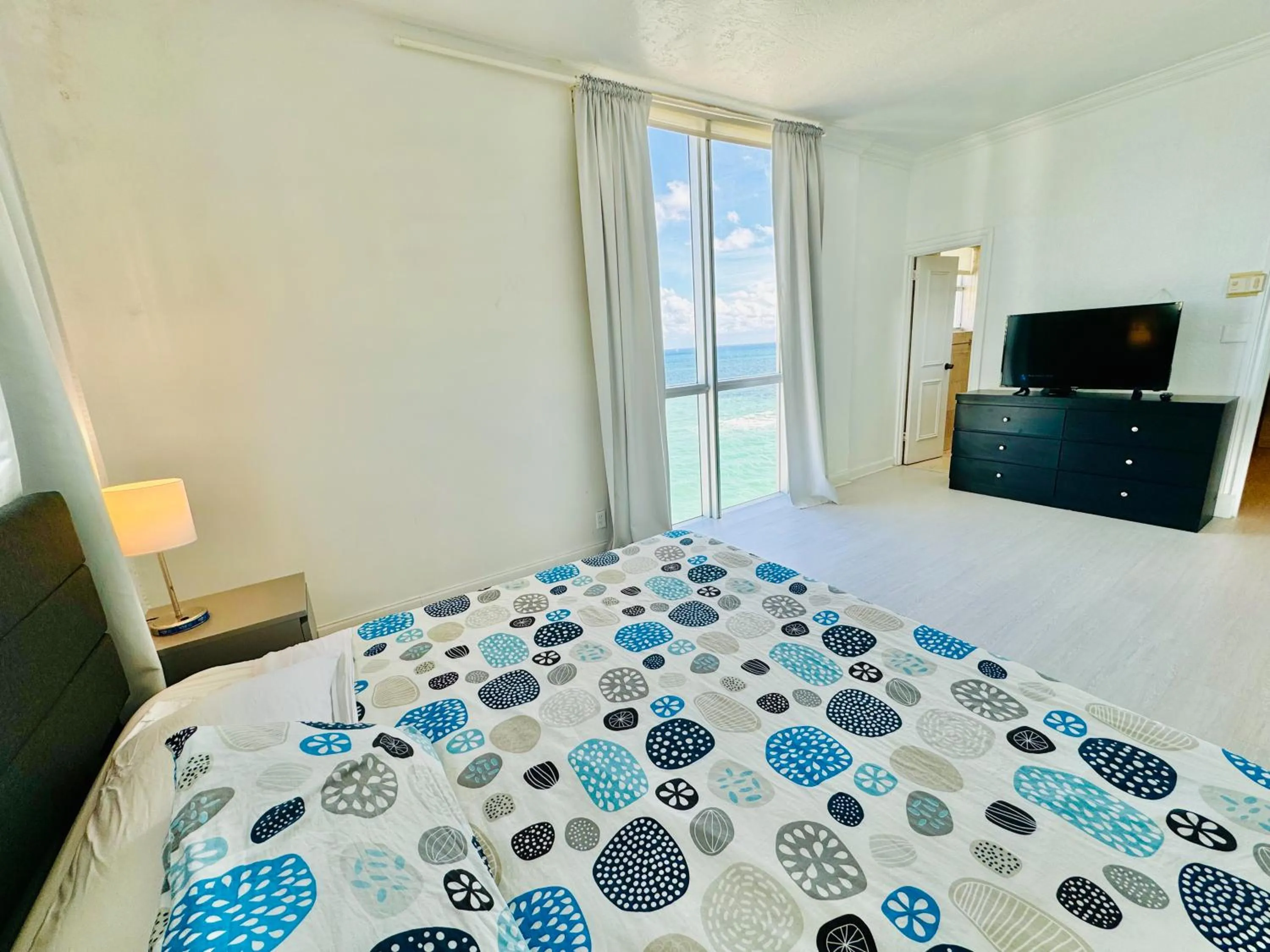 Bed in Miami Hallandale Condo, Partial Ocean View Direct Beach and Pool Access Miami Hollywood Beach