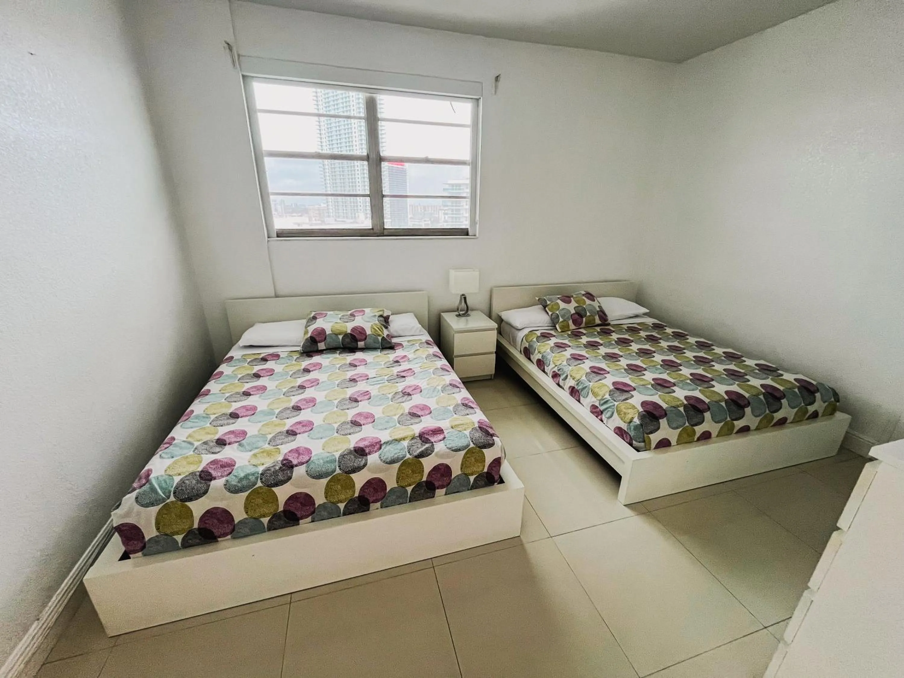 Bed in Miami Hallandale Condo, Partial Ocean View Direct Beach and Pool Access Miami Hollywood Beach