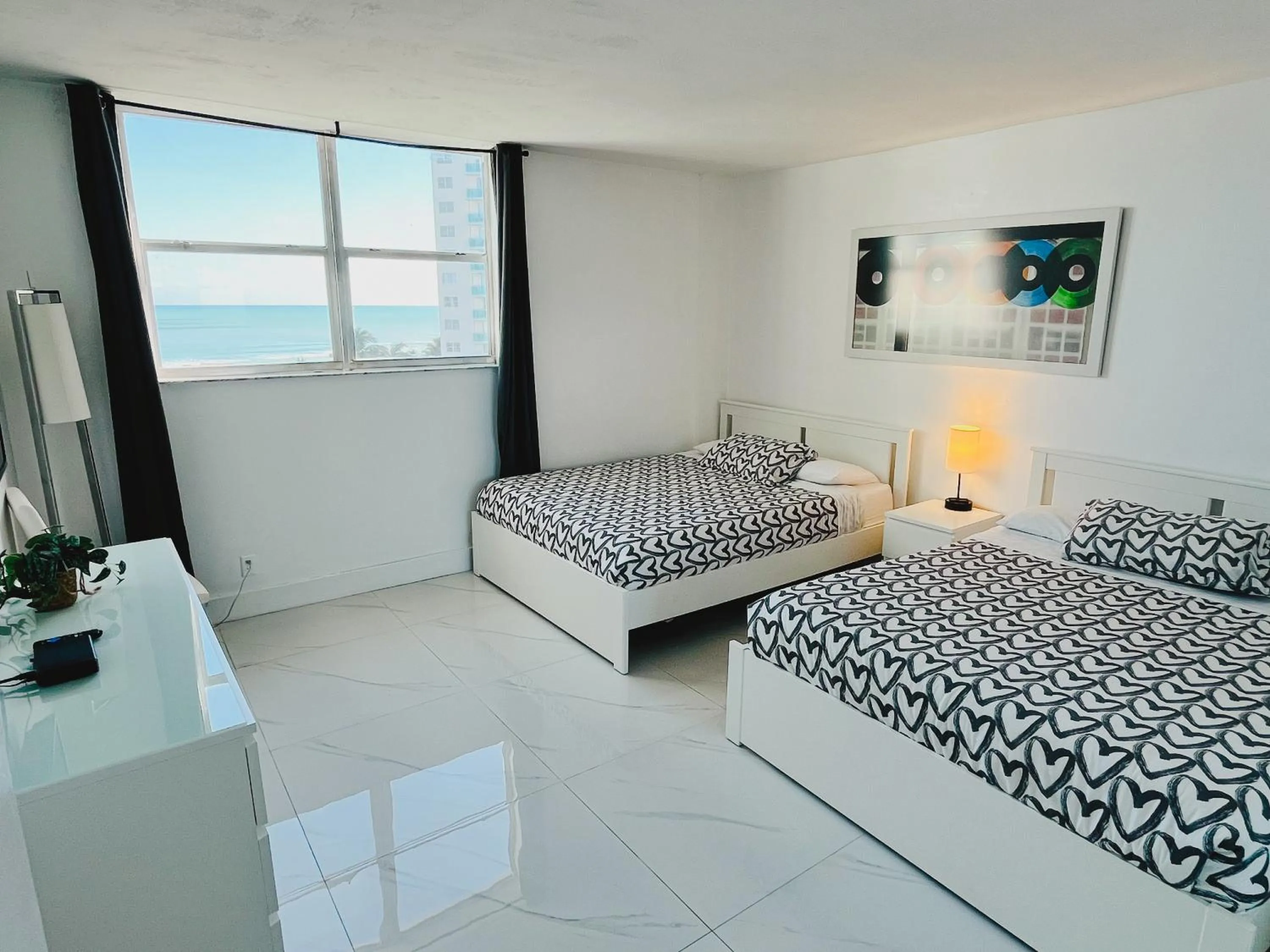 Bed in Miami Hallandale Condo, Partial Ocean View Direct Beach and Pool Access Miami Hollywood Beach