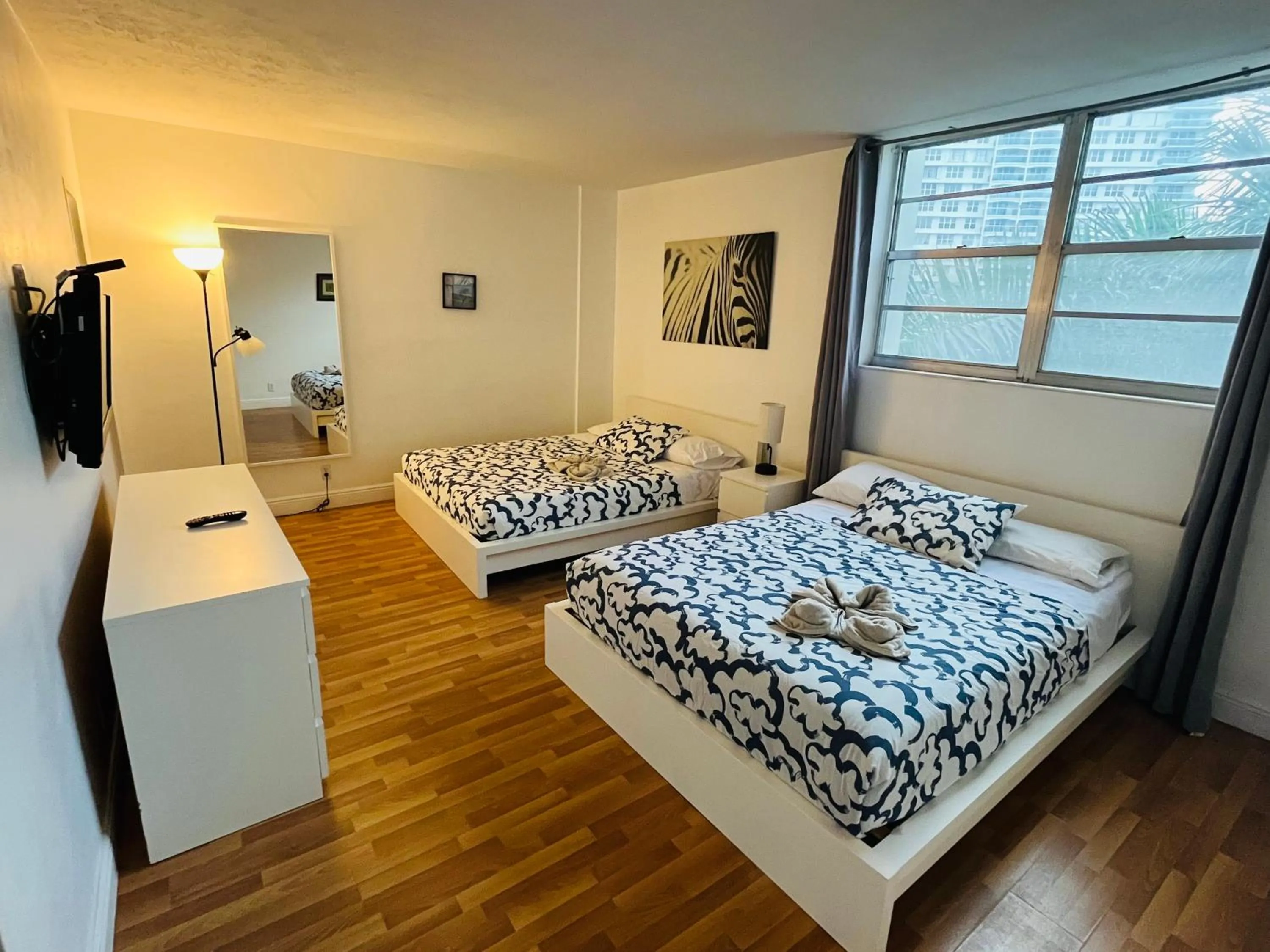 Bed in Miami Hallandale Condo, Partial Ocean View Direct Beach and Pool Access Miami Hollywood Beach