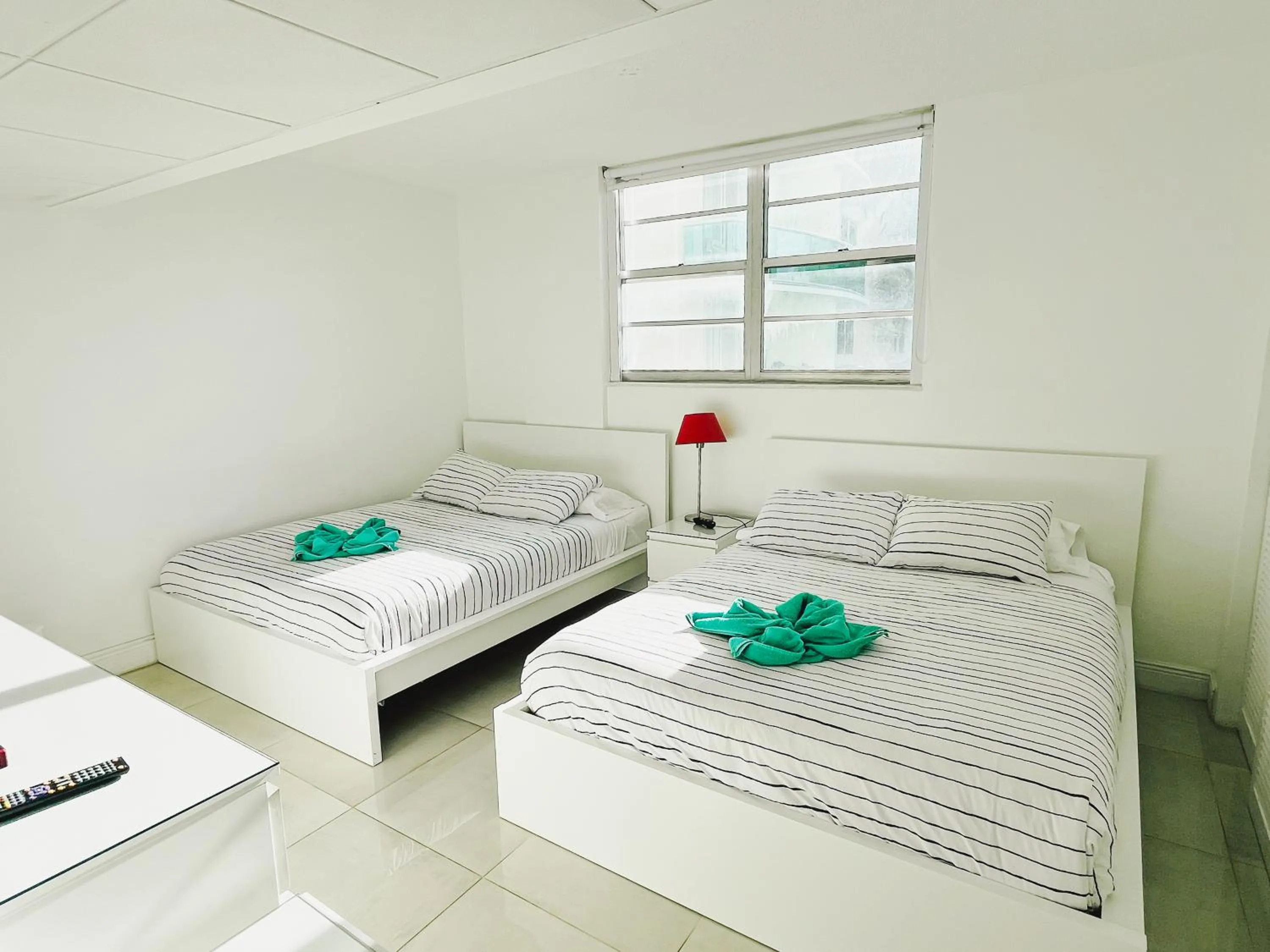 Bed in Miami Hallandale Condo, Partial Ocean View Direct Beach and Pool Access Miami Hollywood Beach