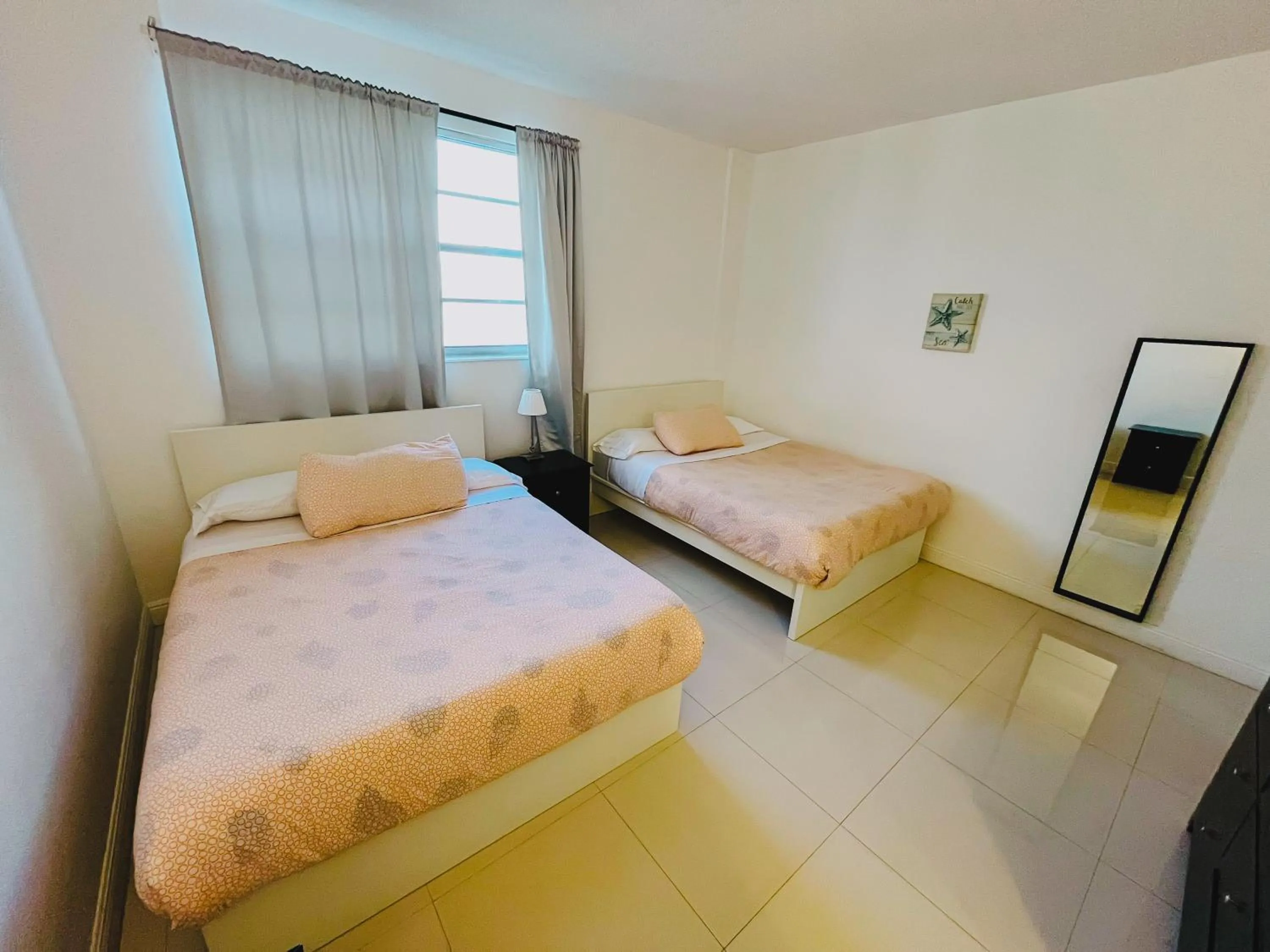 Bed in Miami Hallandale Condo, Partial Ocean View Direct Beach and Pool Access Miami Hollywood Beach