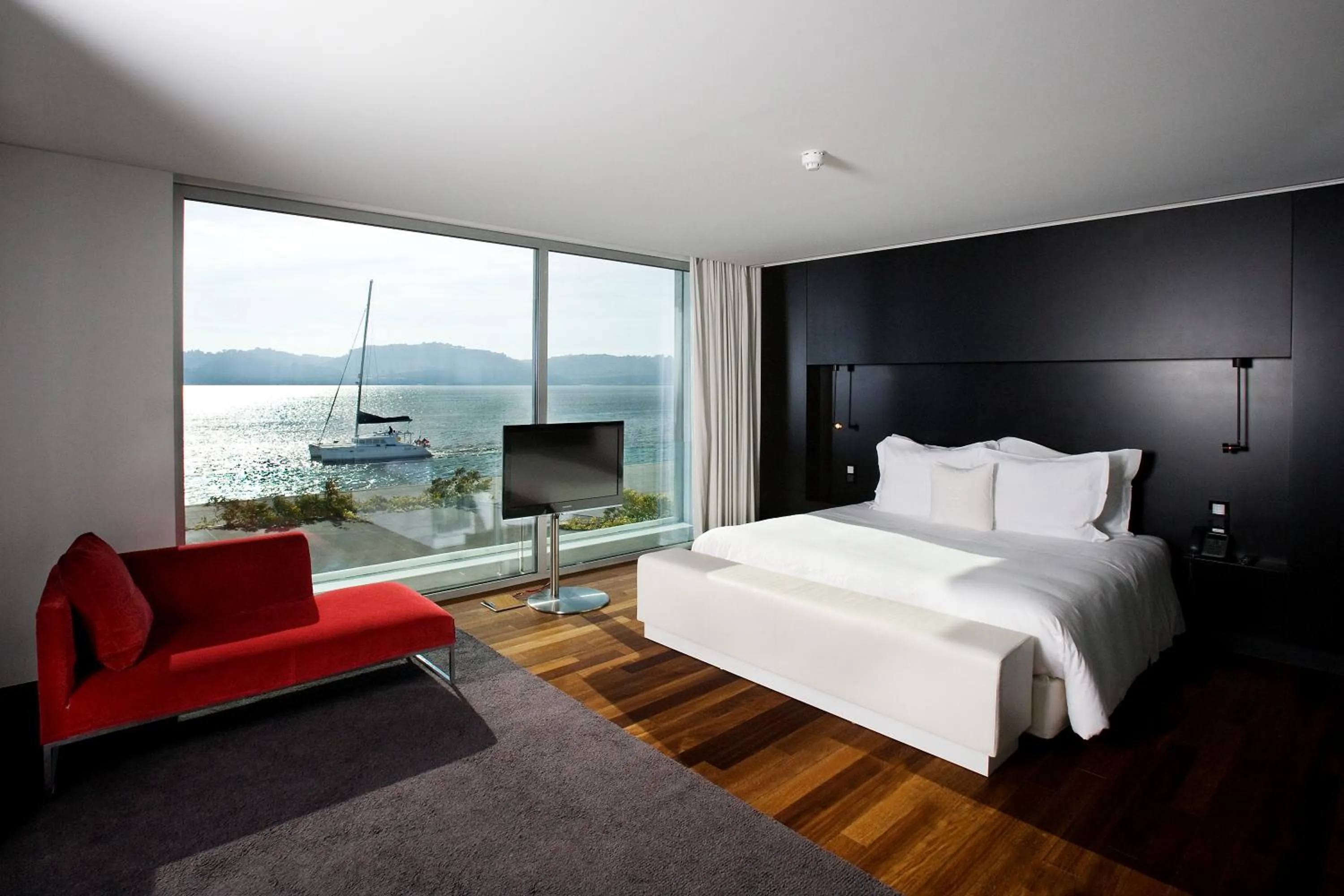 Living room, Bed in Altis Belem Hotel & Spa, a Member of Design Hotels