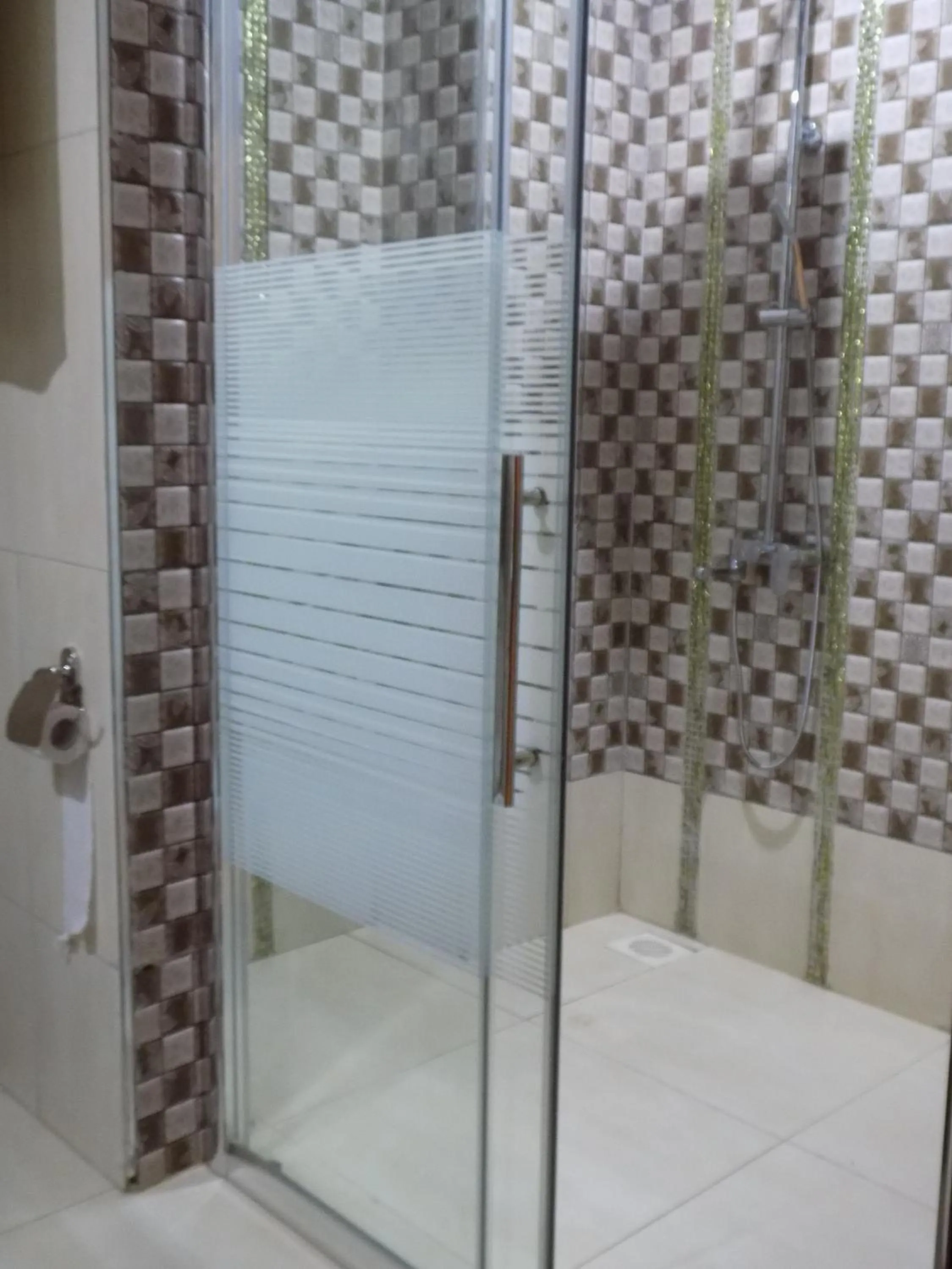 Shower in Freedom City Hotel Najjanankumbi Kamapala