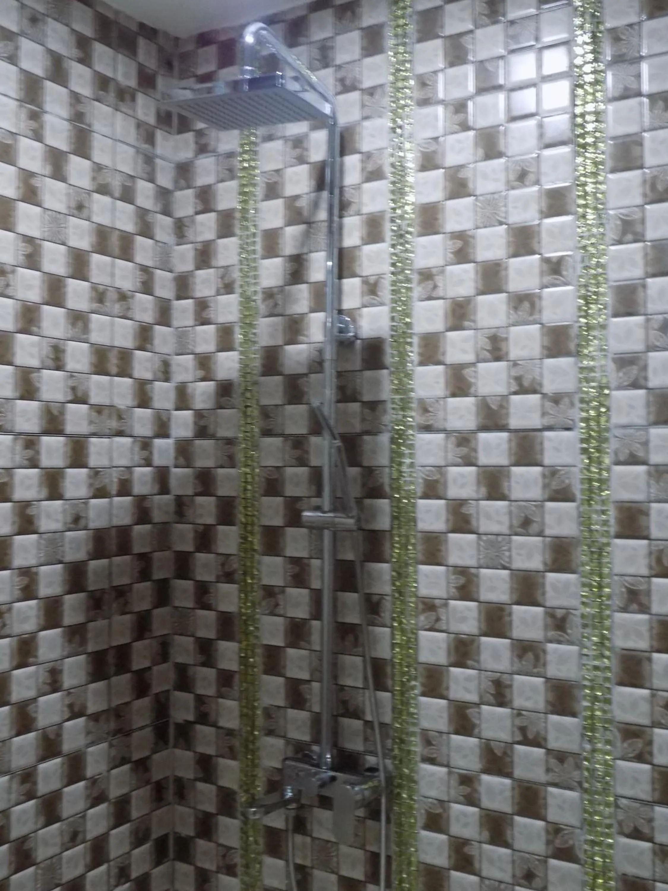 Shower in Freedom City Hotel Najjanankumbi Kamapala