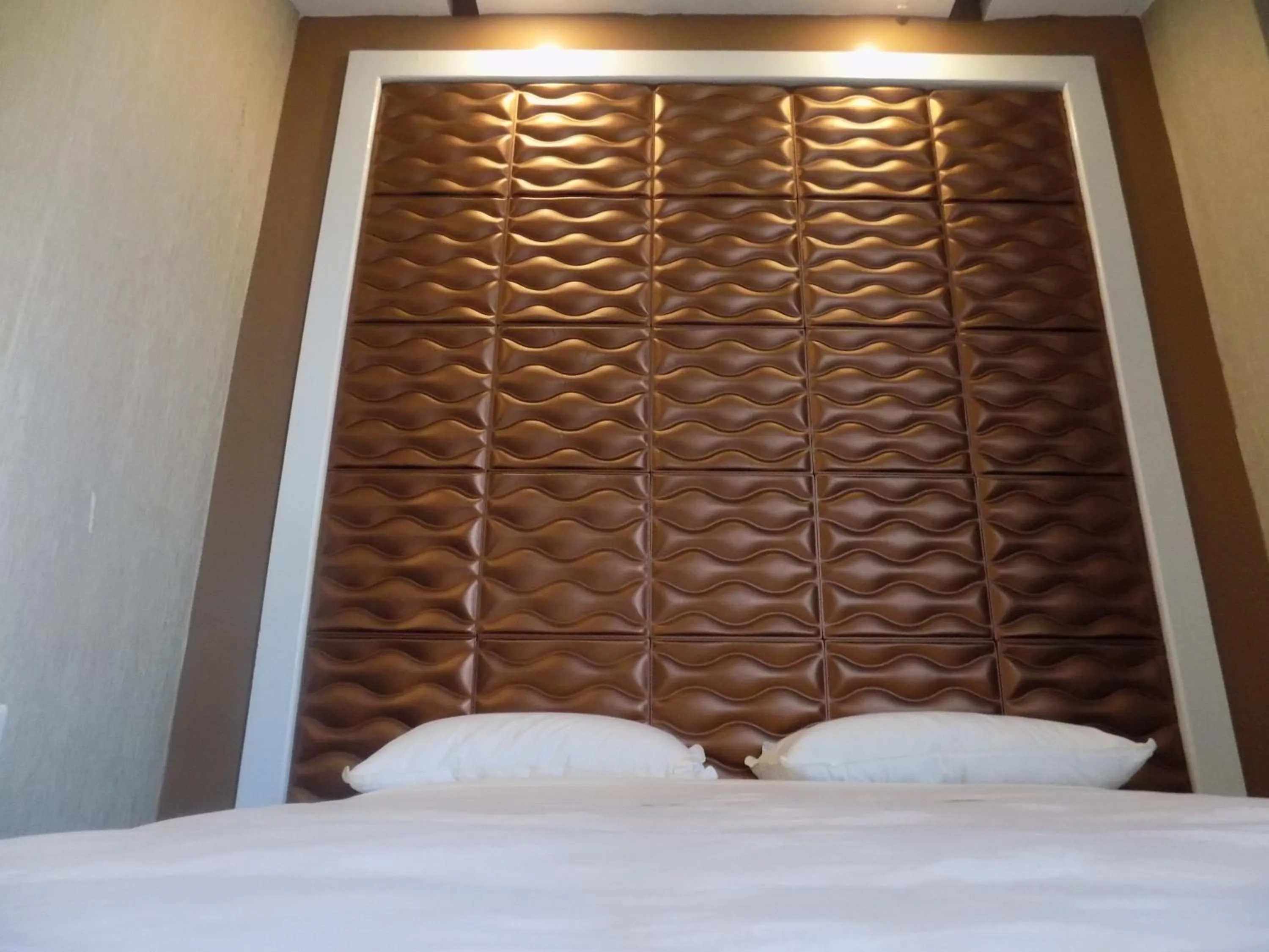 Bedroom in Freedom City Hotel Najjanankumbi Kamapala