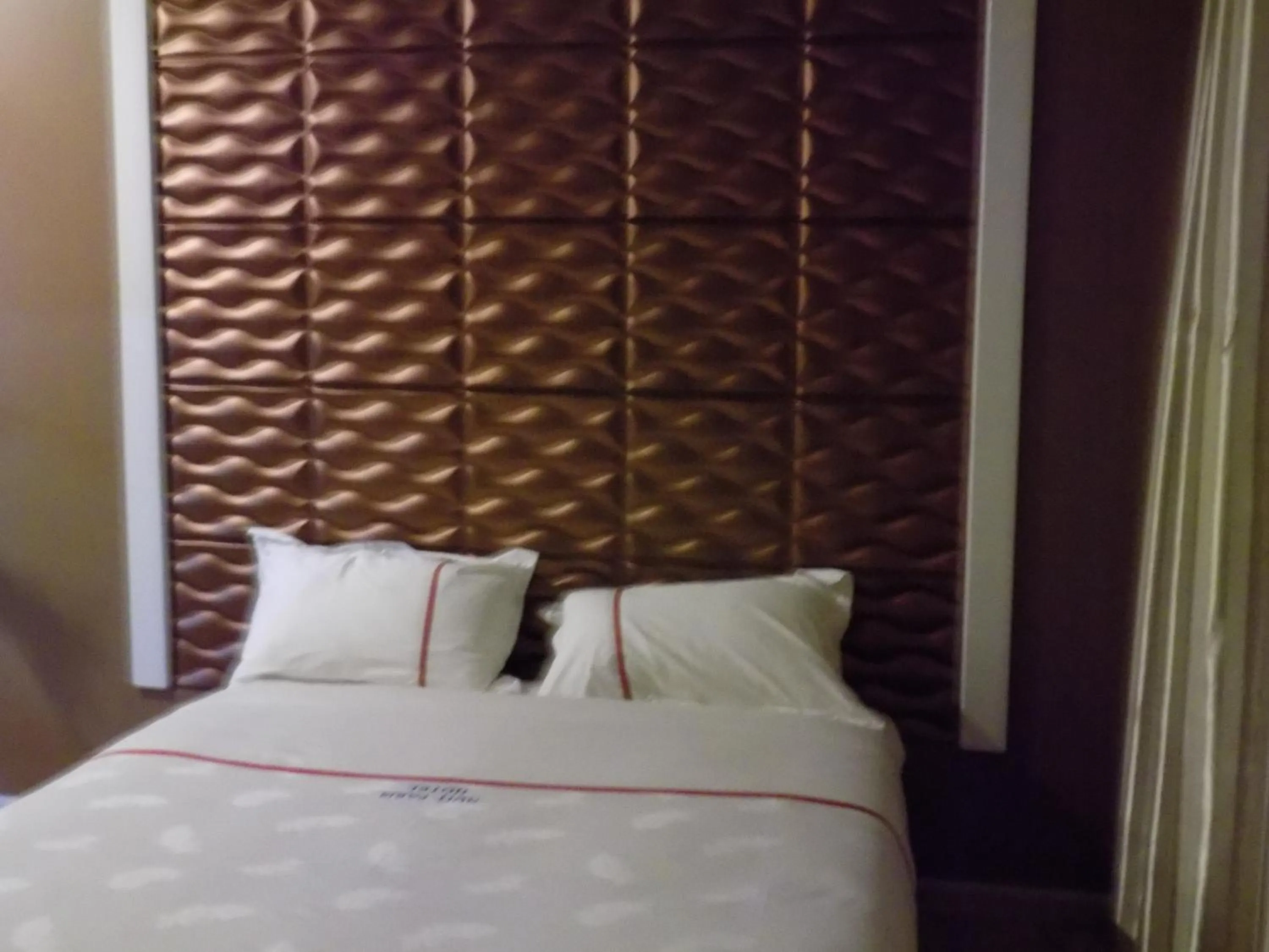 Bedroom in Freedom City Hotel Najjanankumbi Kamapala