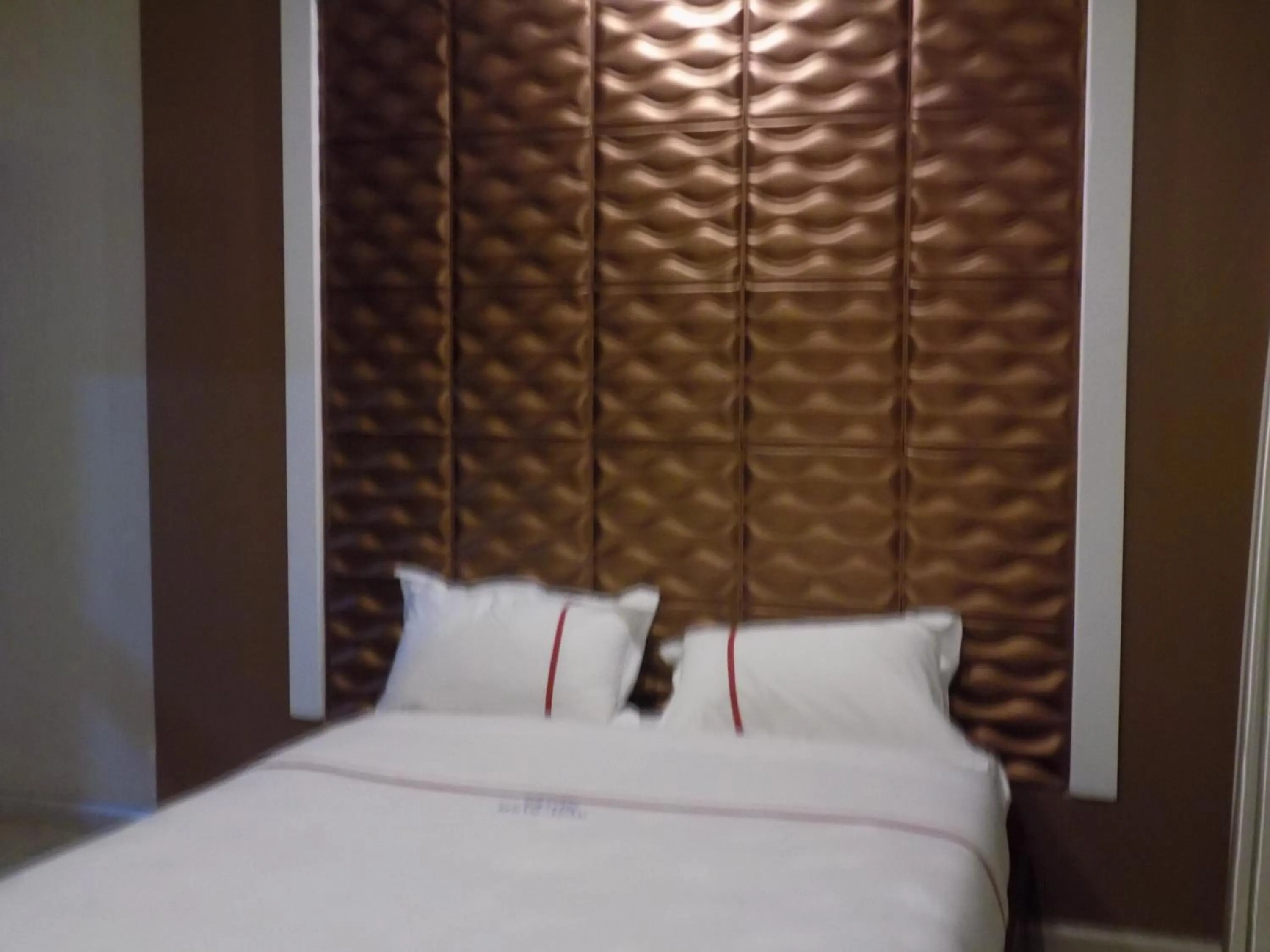 Bedroom in Freedom City Hotel Najjanankumbi Kamapala