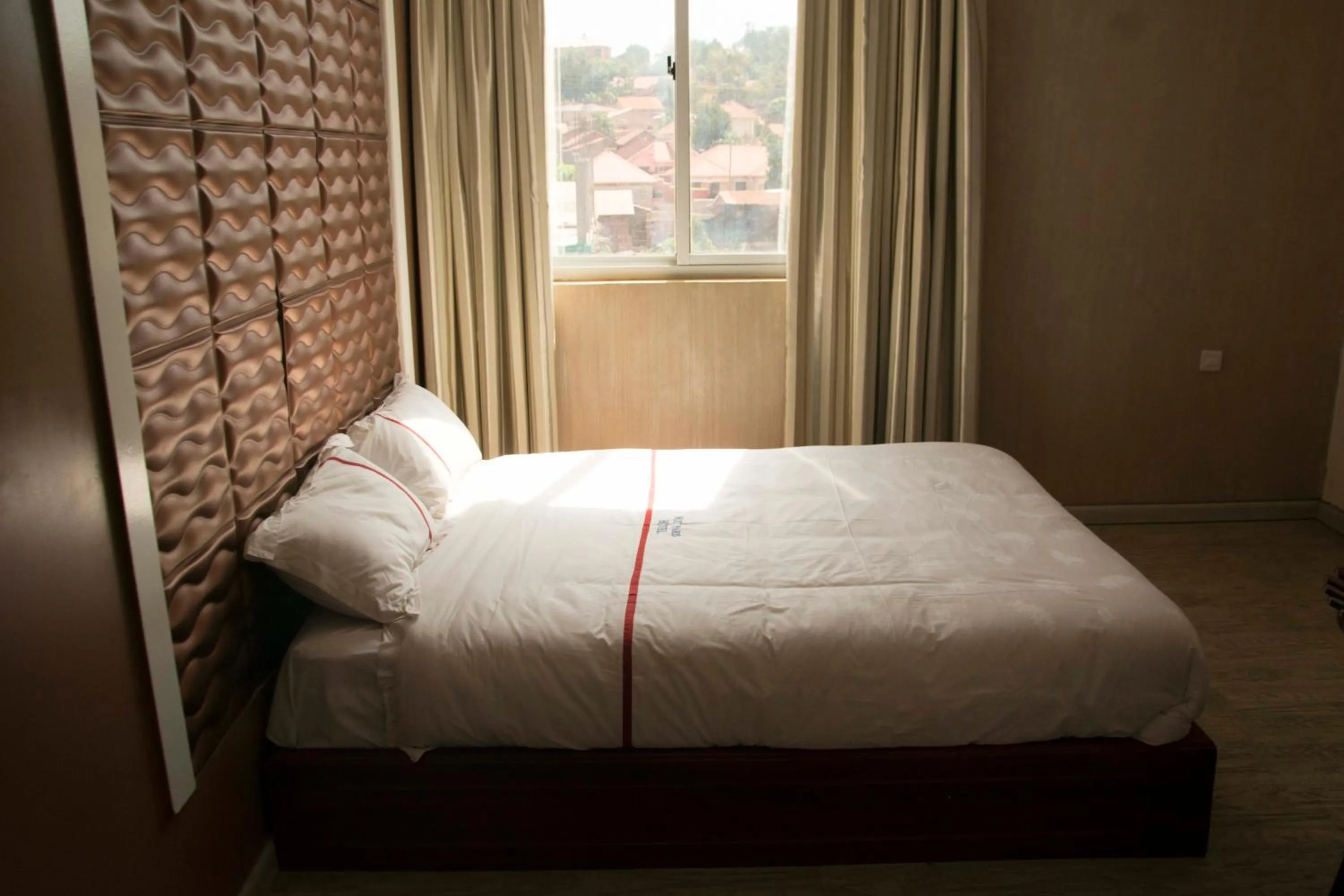 Bed in Freedom City Hotel Najjanankumbi Kamapala