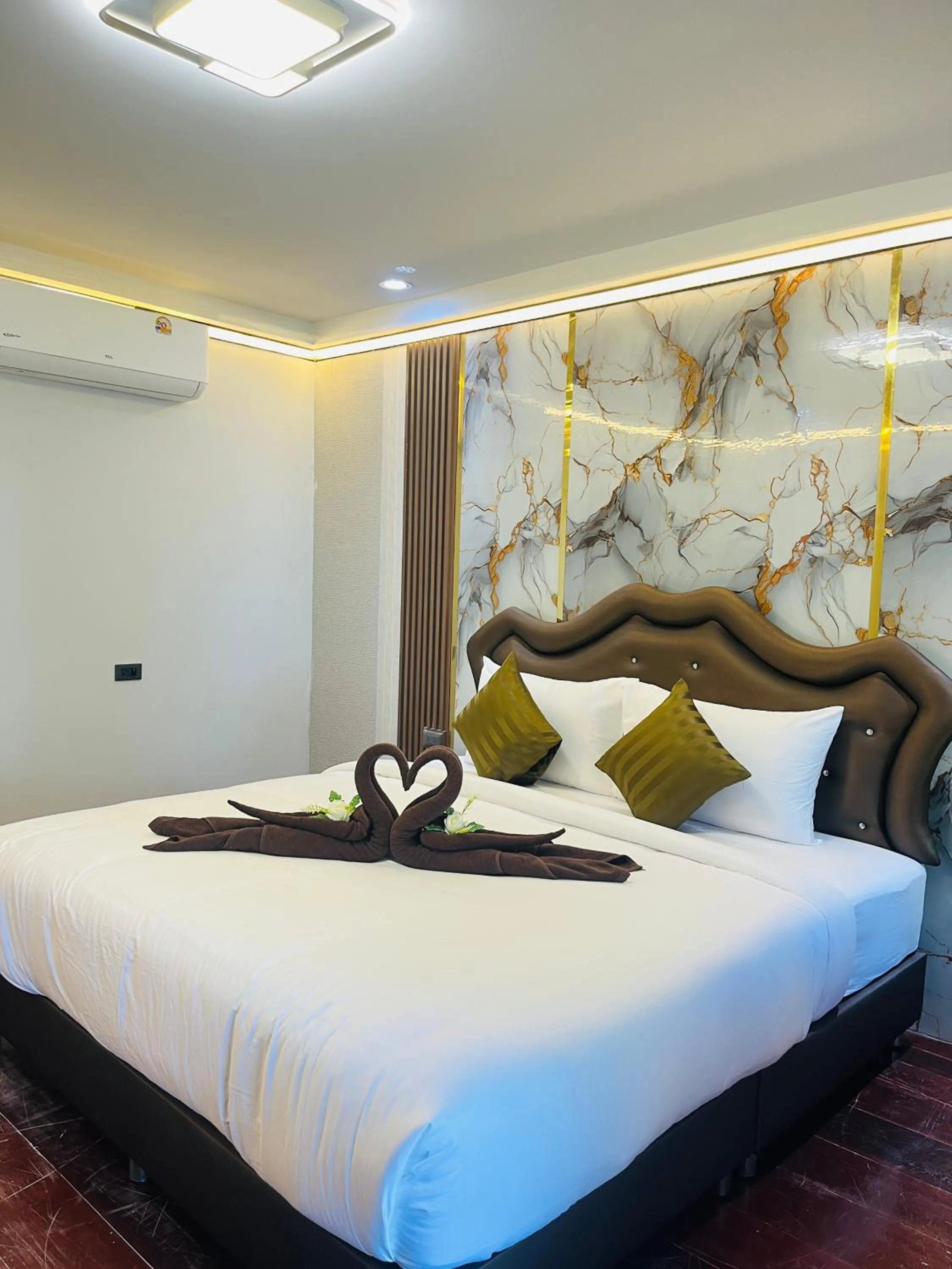 Bed in New Ozone Resort & Spa