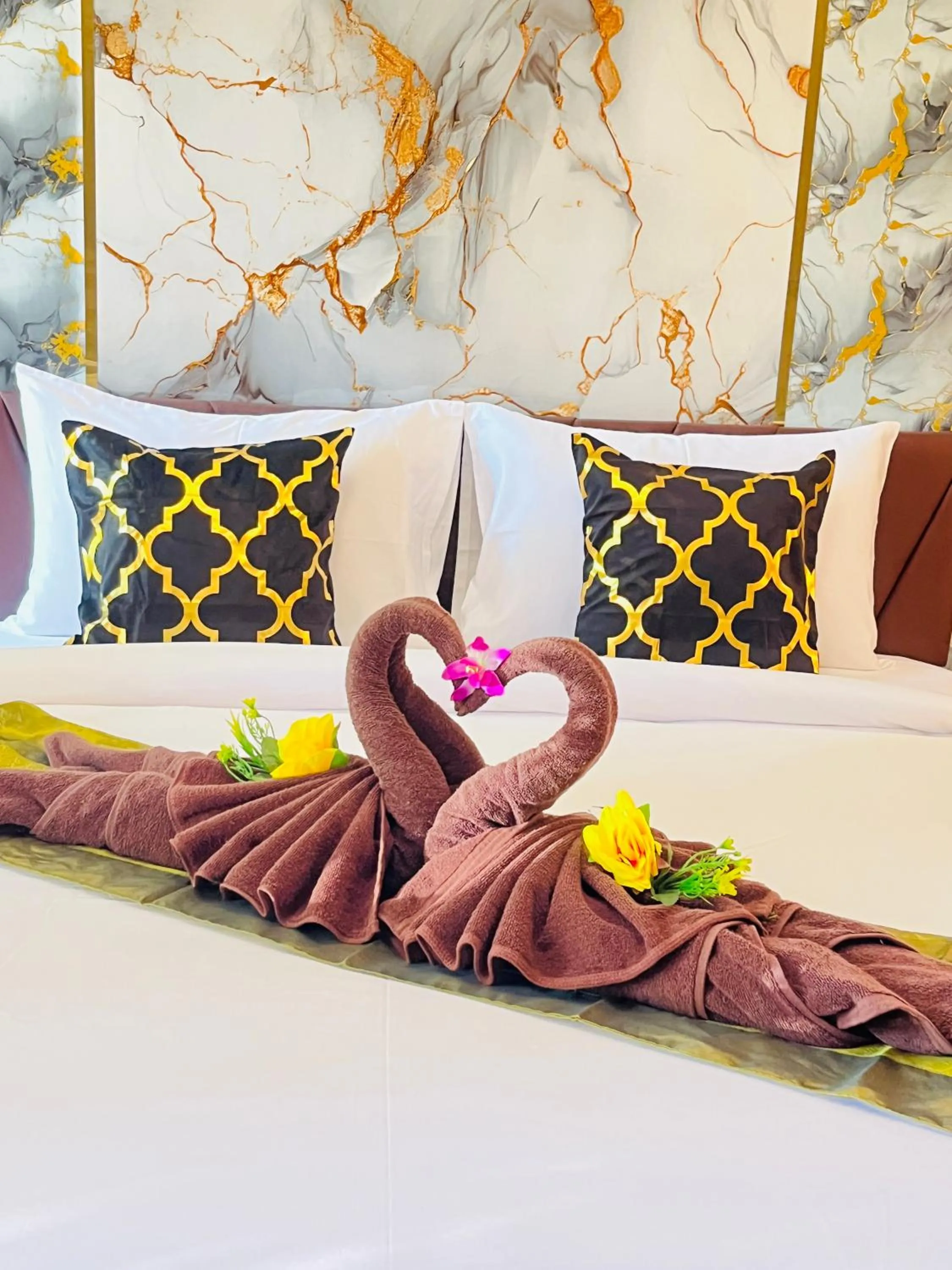 Bed in New Ozone Resort & Spa