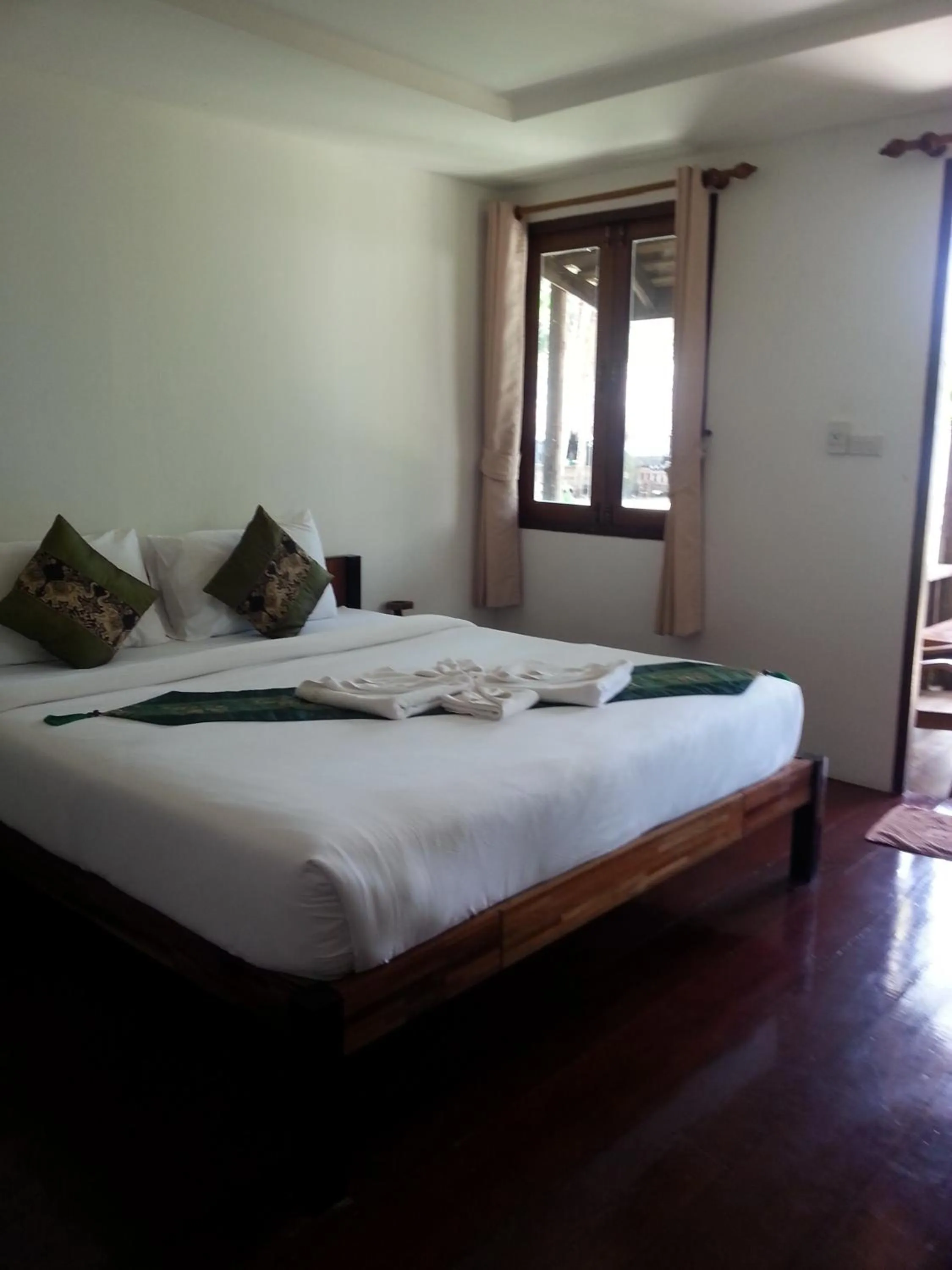 Photo of the whole room, Bed in New Ozone Resort & Spa