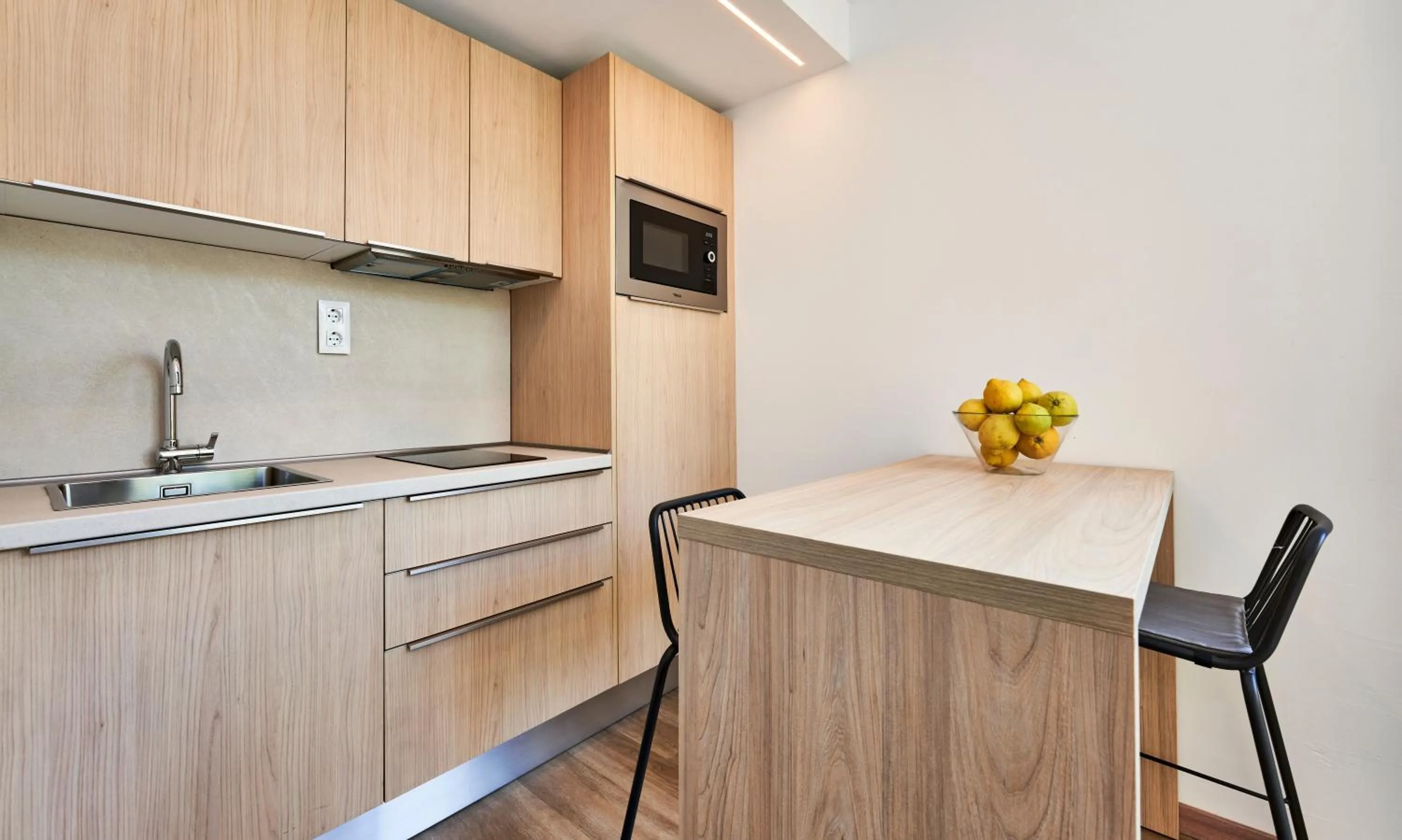 Kitchen or kitchenette in Apartamentos S'Olivera