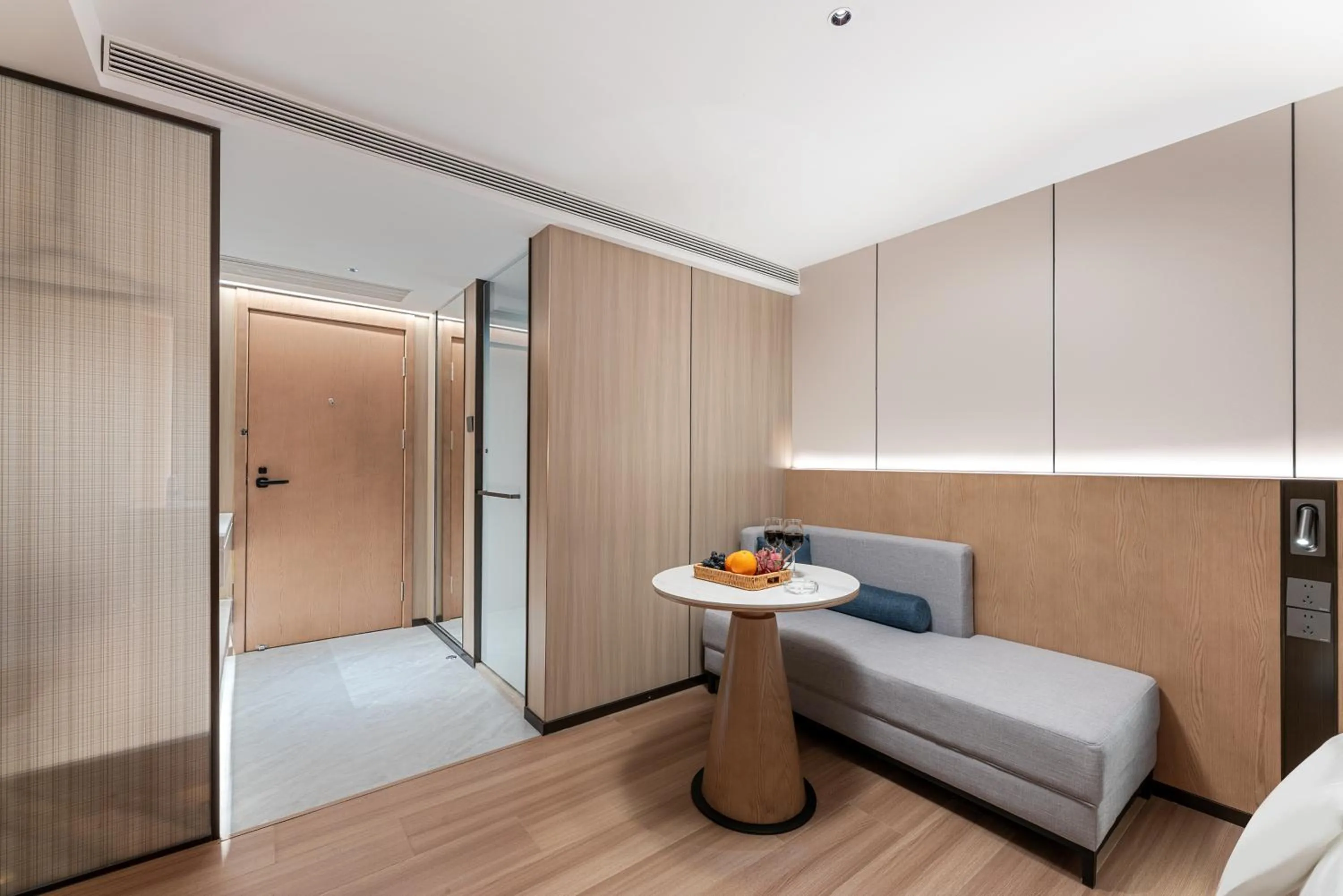 Living room, Bed in Guangzhou JinTang Hotel