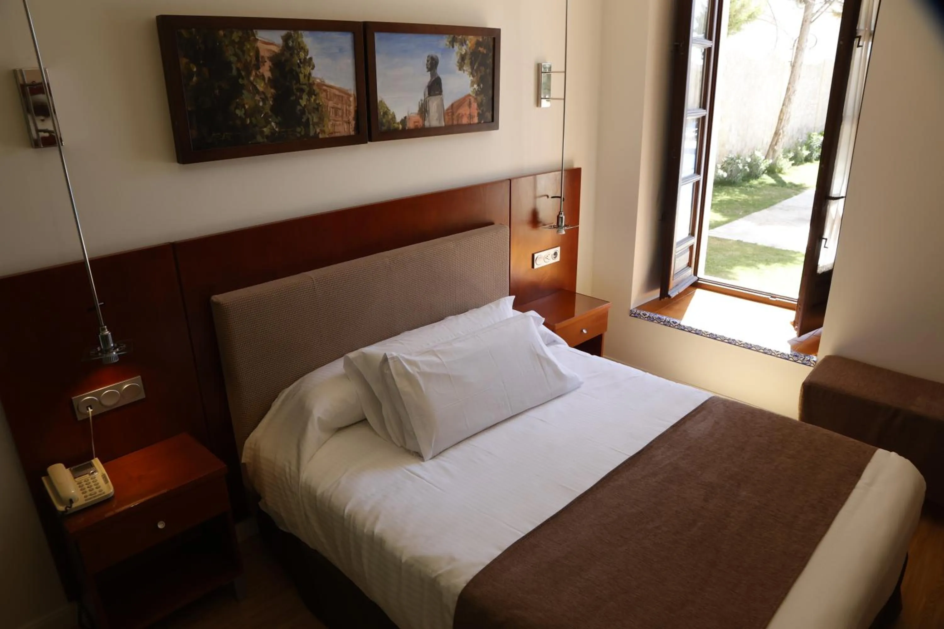 Bed in Hotel El Carmen