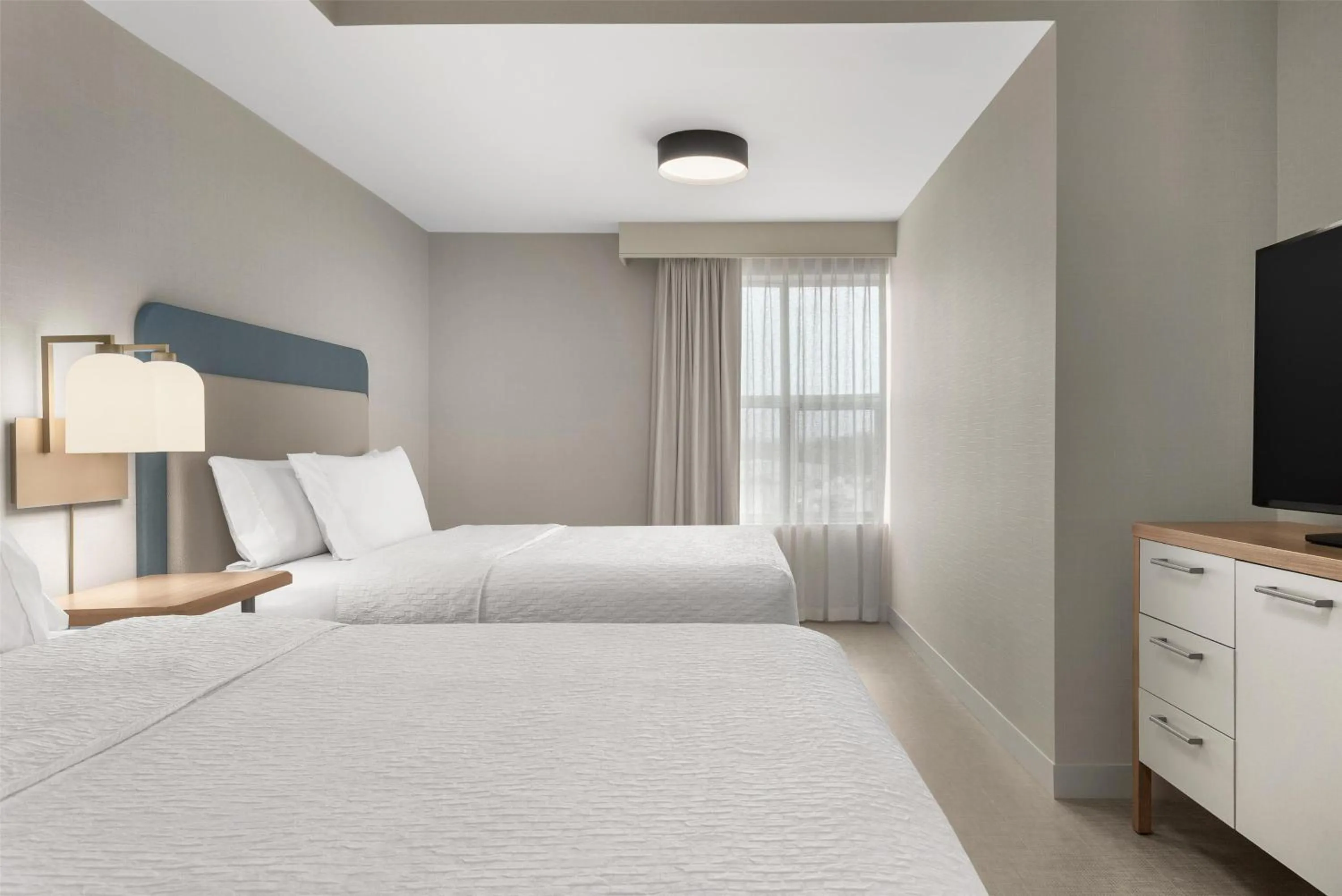 Bed in Homewood Suites by Hilton Burlington