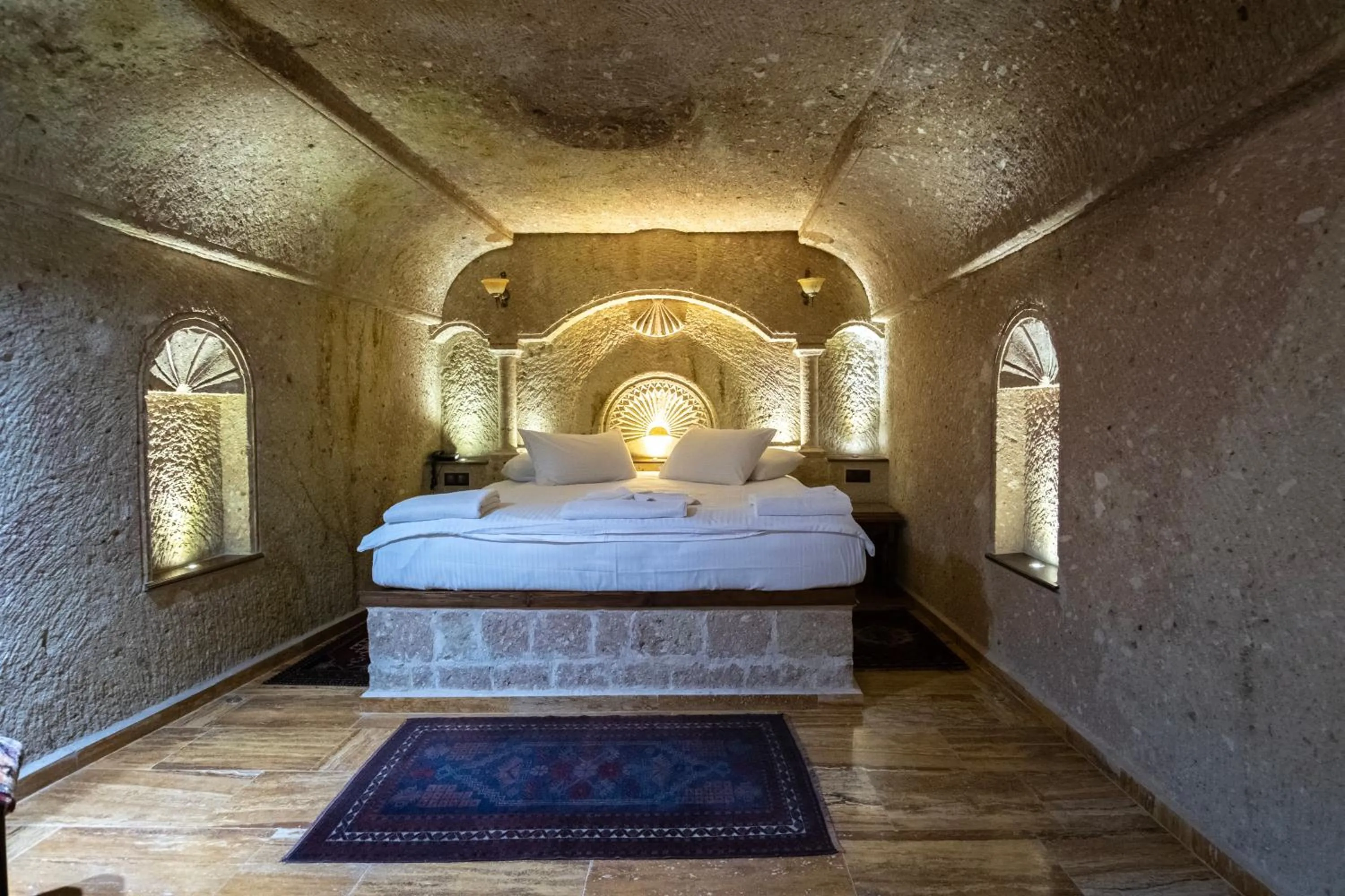 Bed in Kemerhan Cave Suites