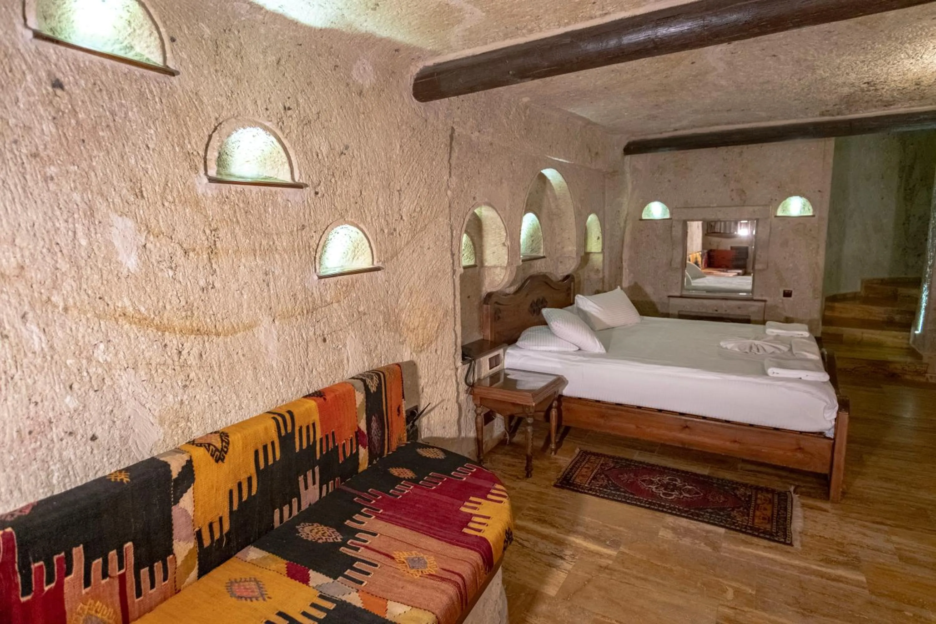 Bed in Kemerhan Cave Suites