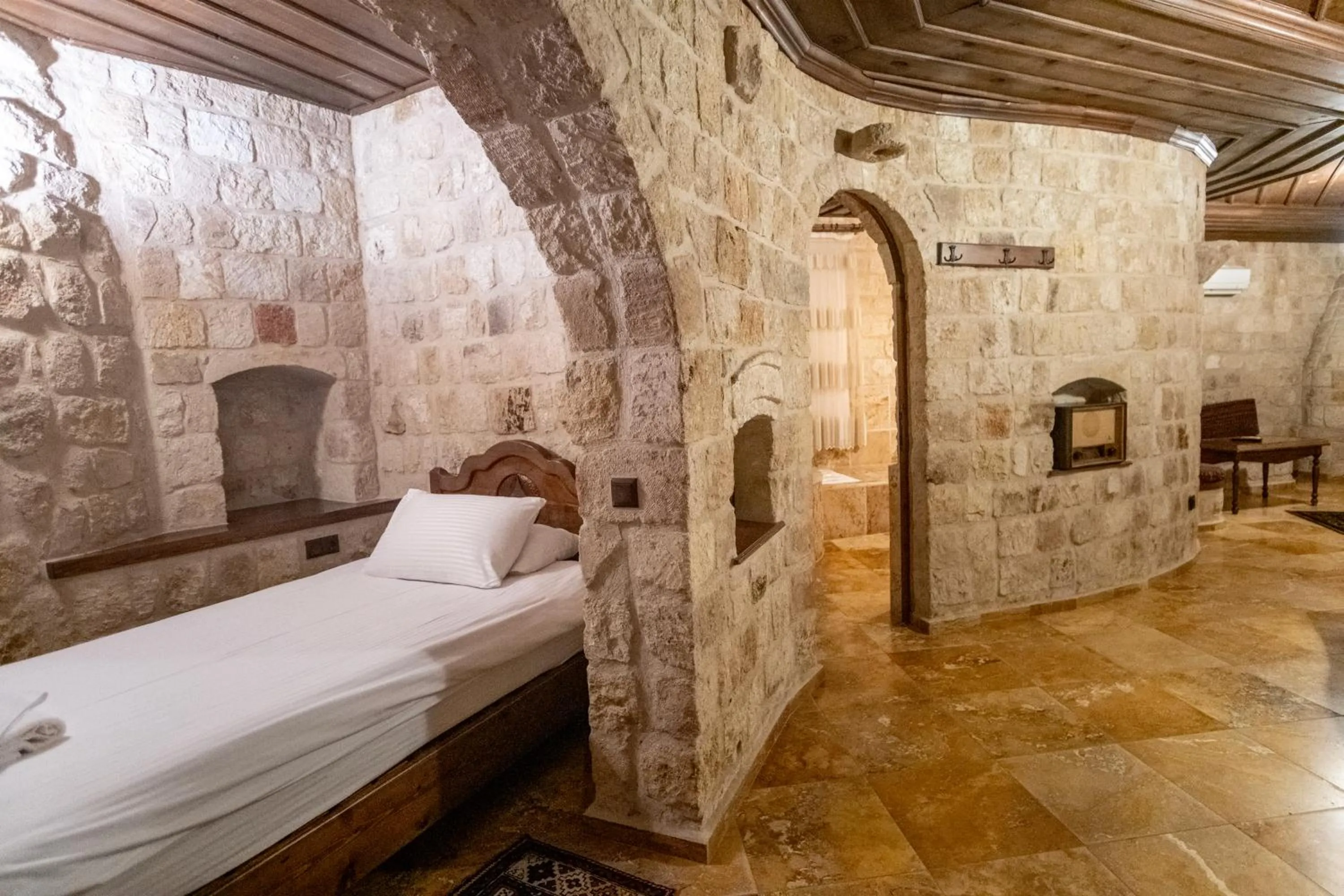 Bed in Kemerhan Cave Suites