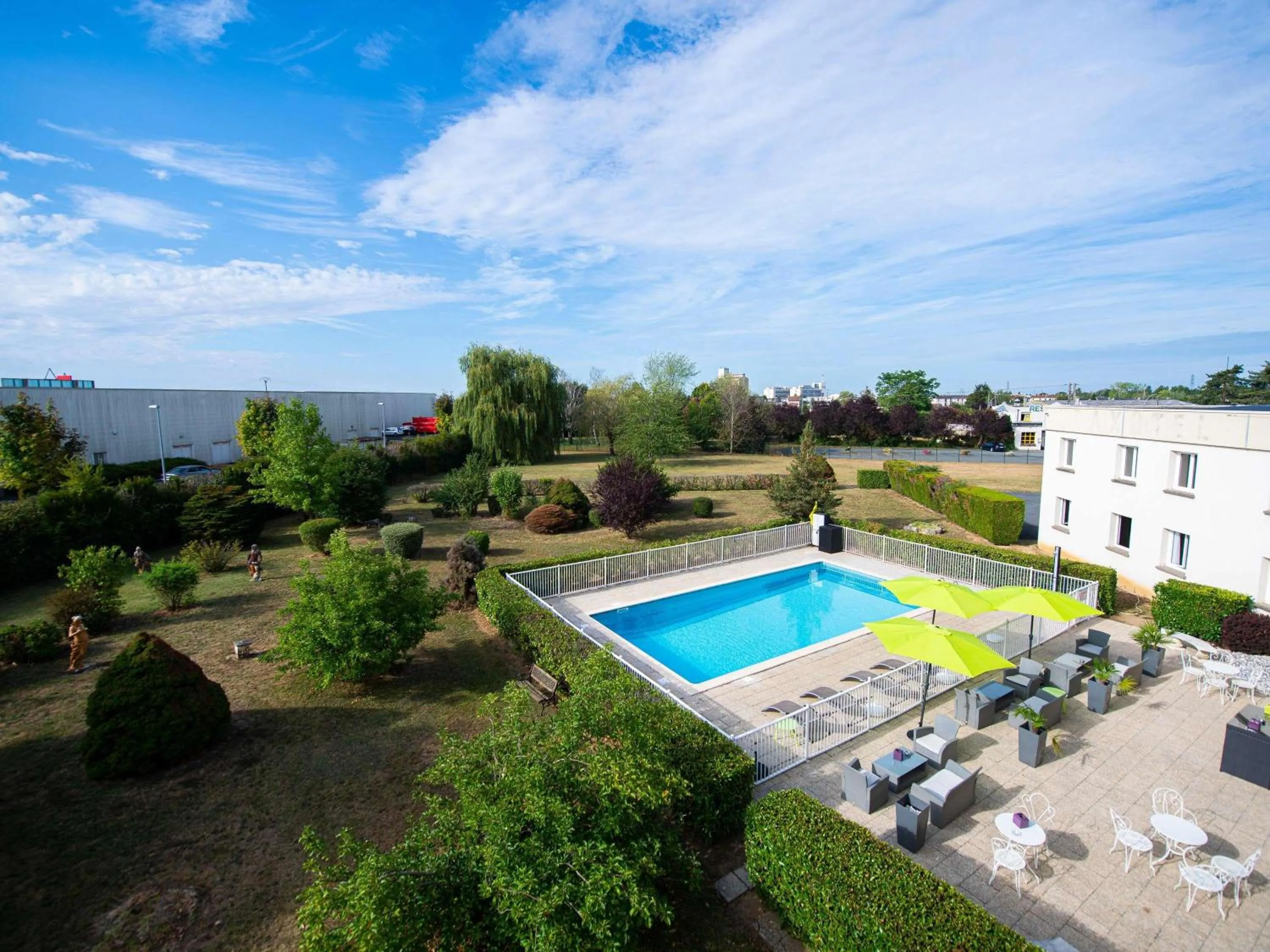 Pool view in ibis Styles Gien