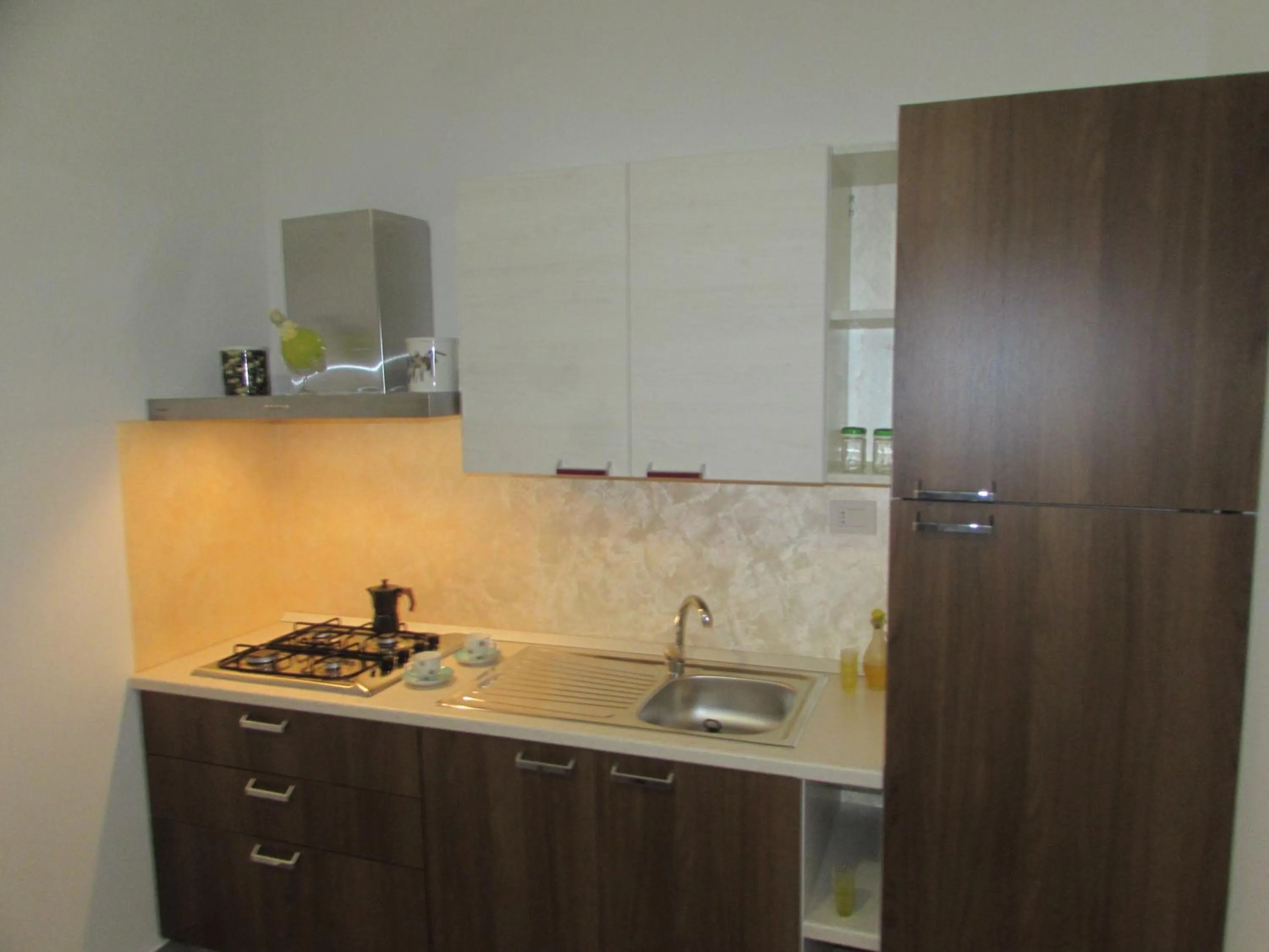 Kitchen or kitchenette in Living Piraino case vacanze