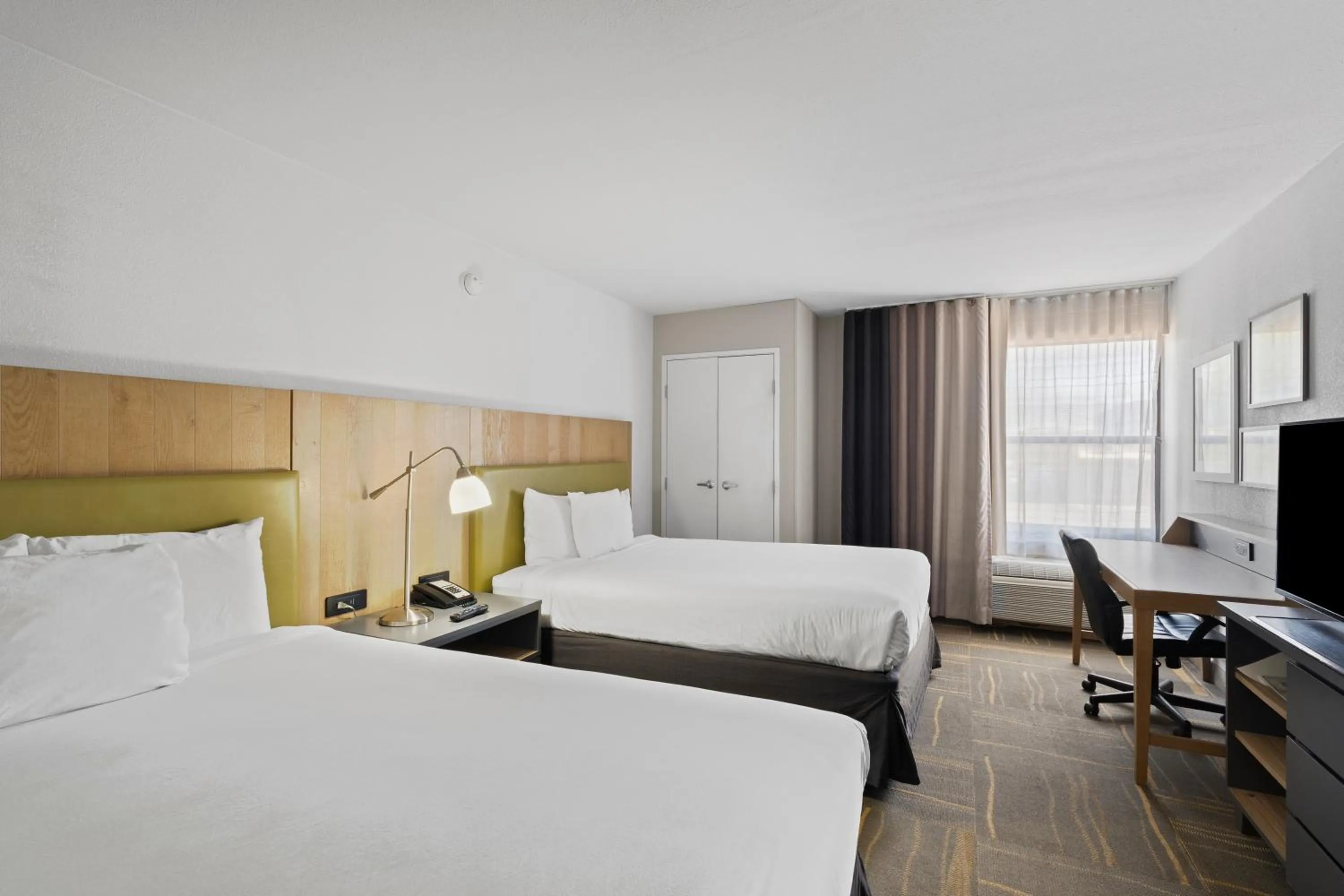 Bed in GreenTree Inn & Suites Phoenix Sky Harbor