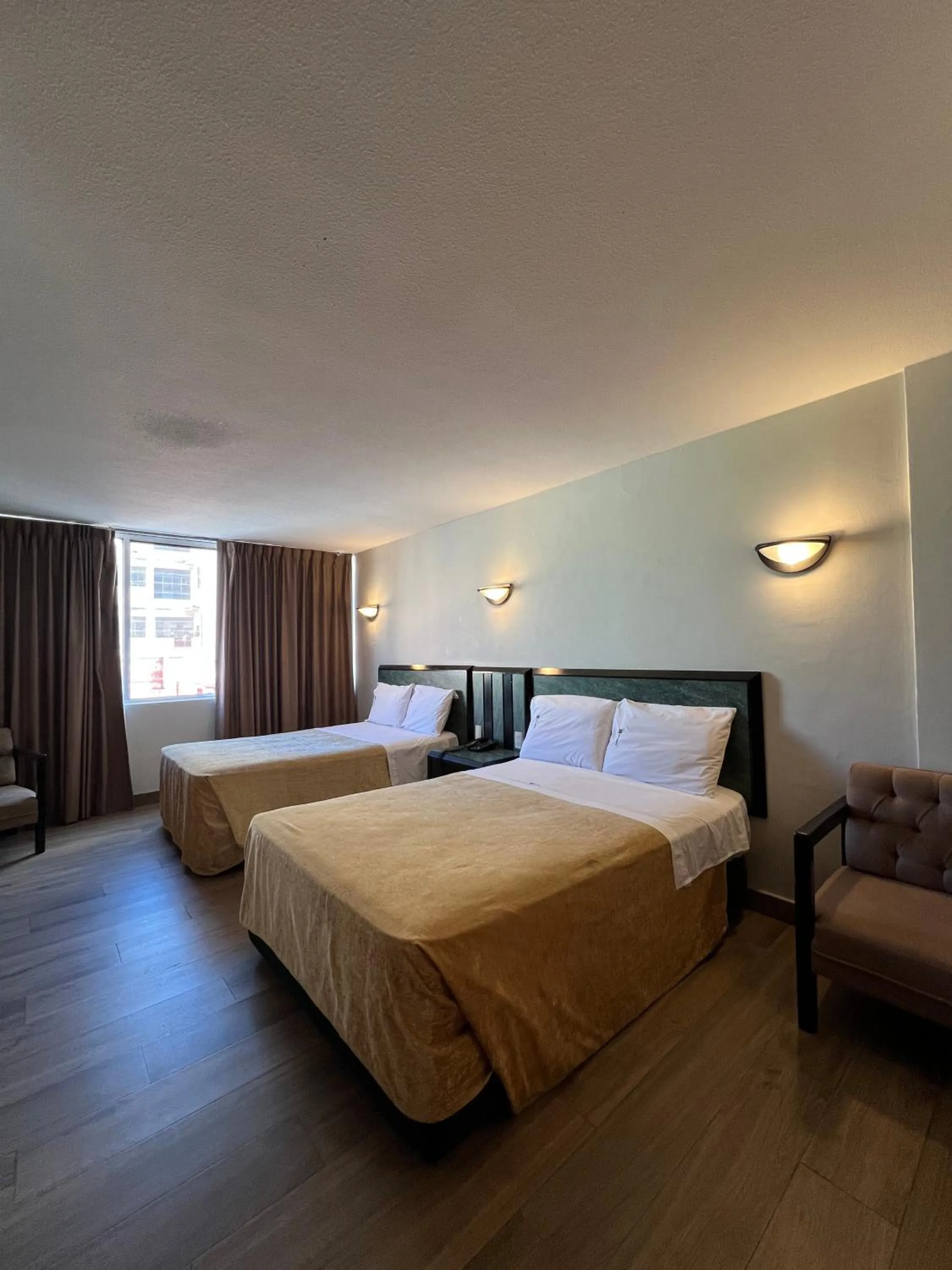 Bed in Hotel Universo