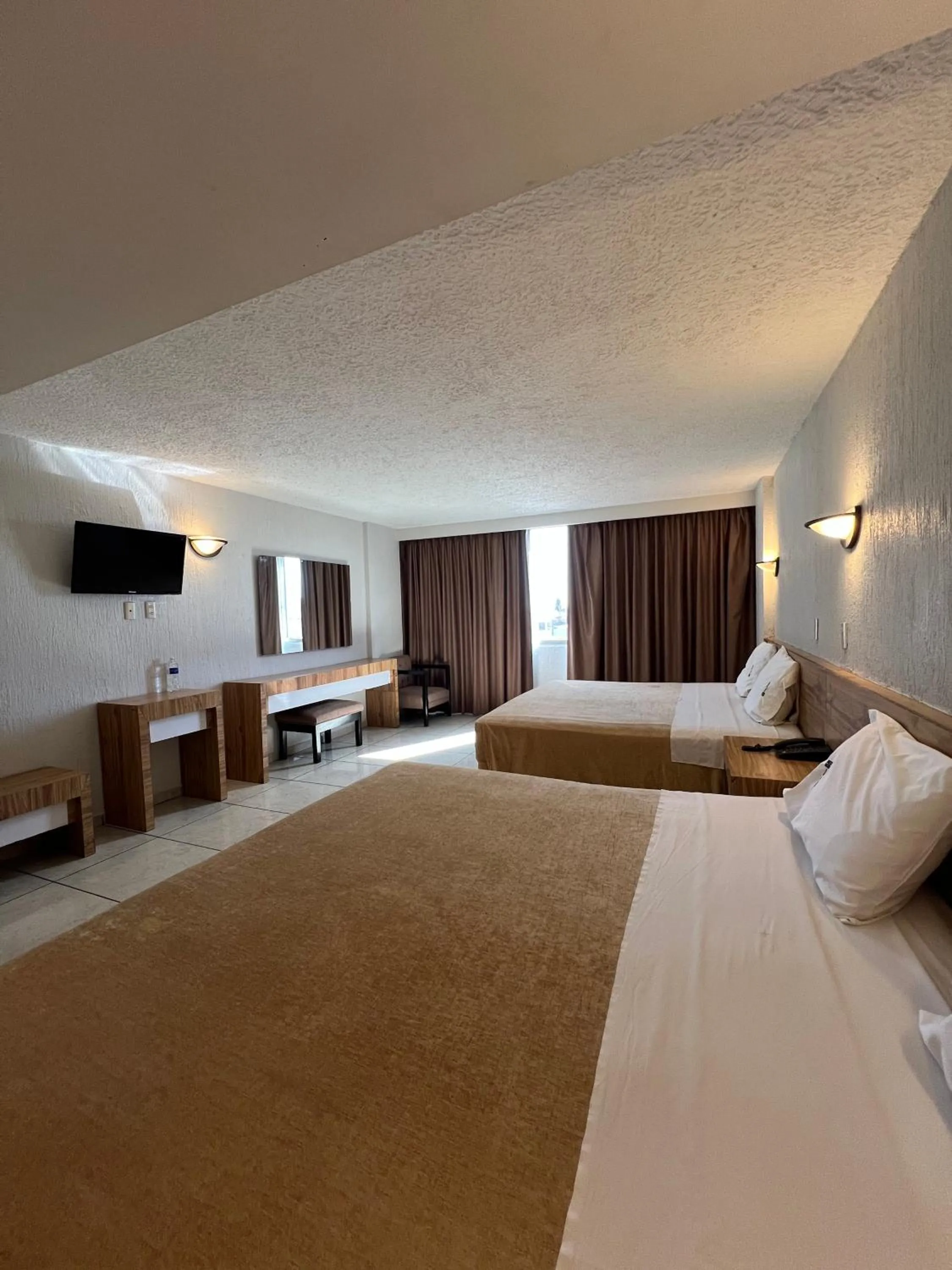 Bed in Hotel Universo