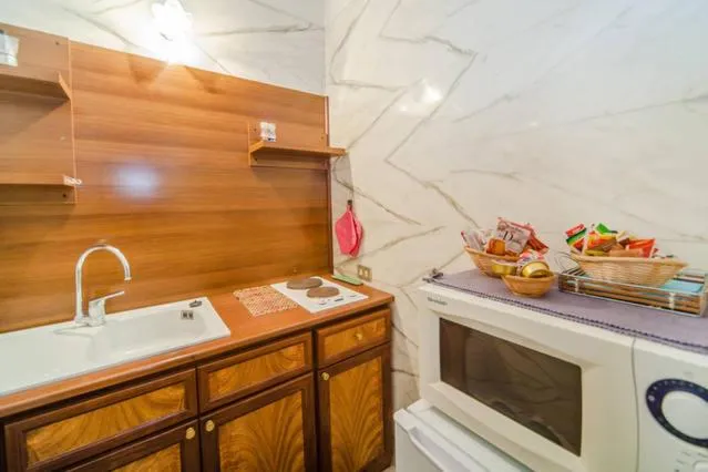 Kitchen or kitchenette in Chiaia B&B