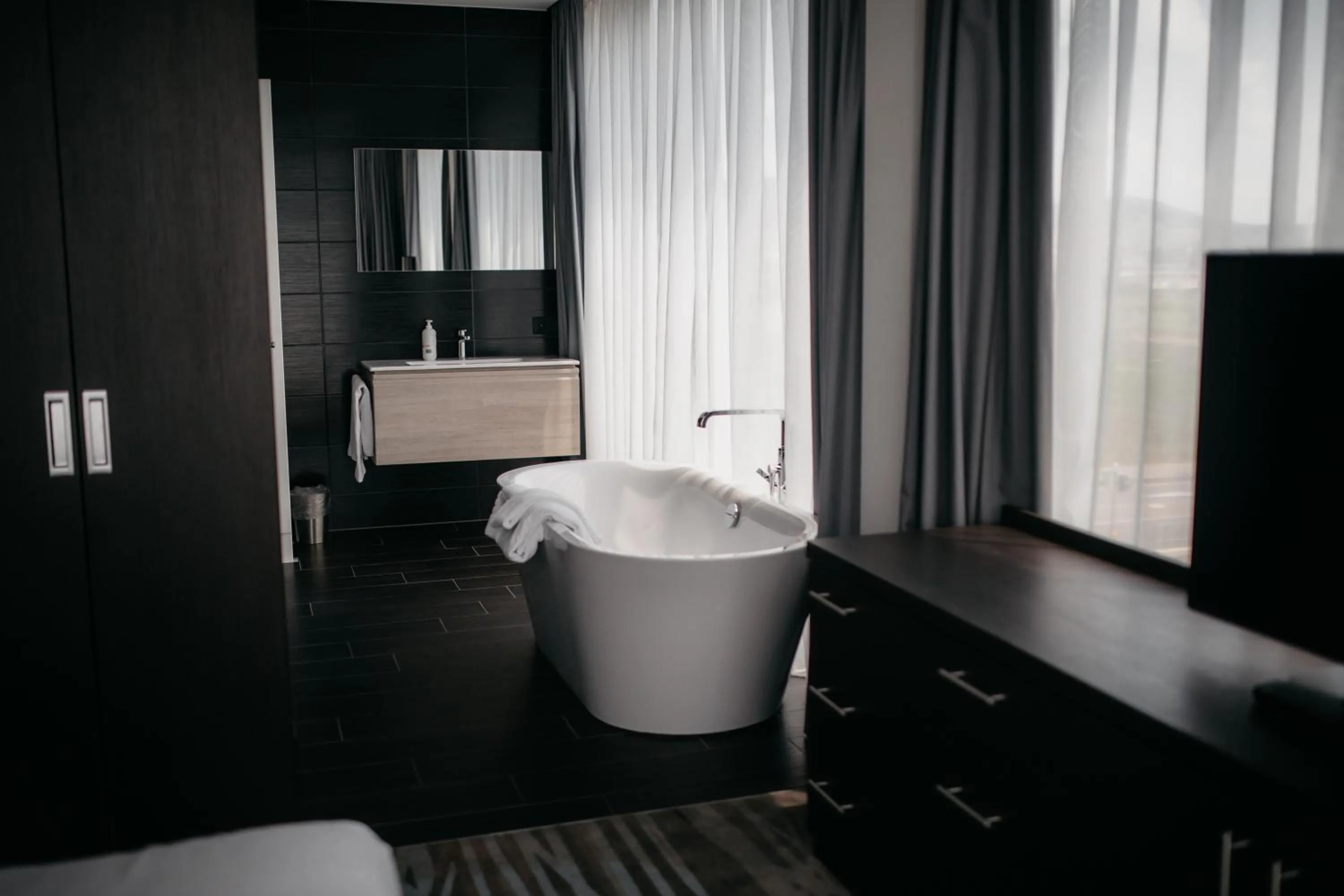 Bathroom, Bed in IIP Apartments - Self Check-In