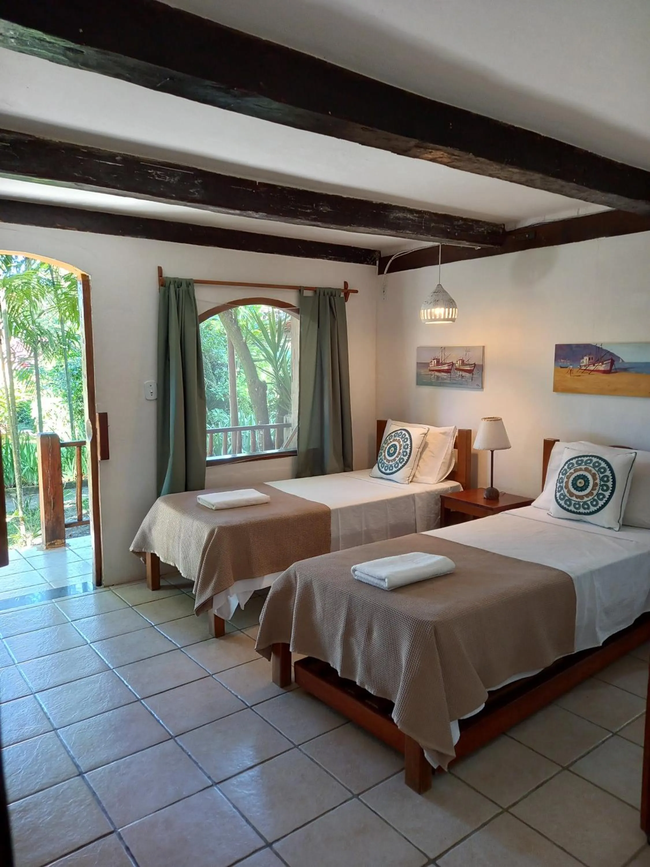 Bed in Pousada Atlântida