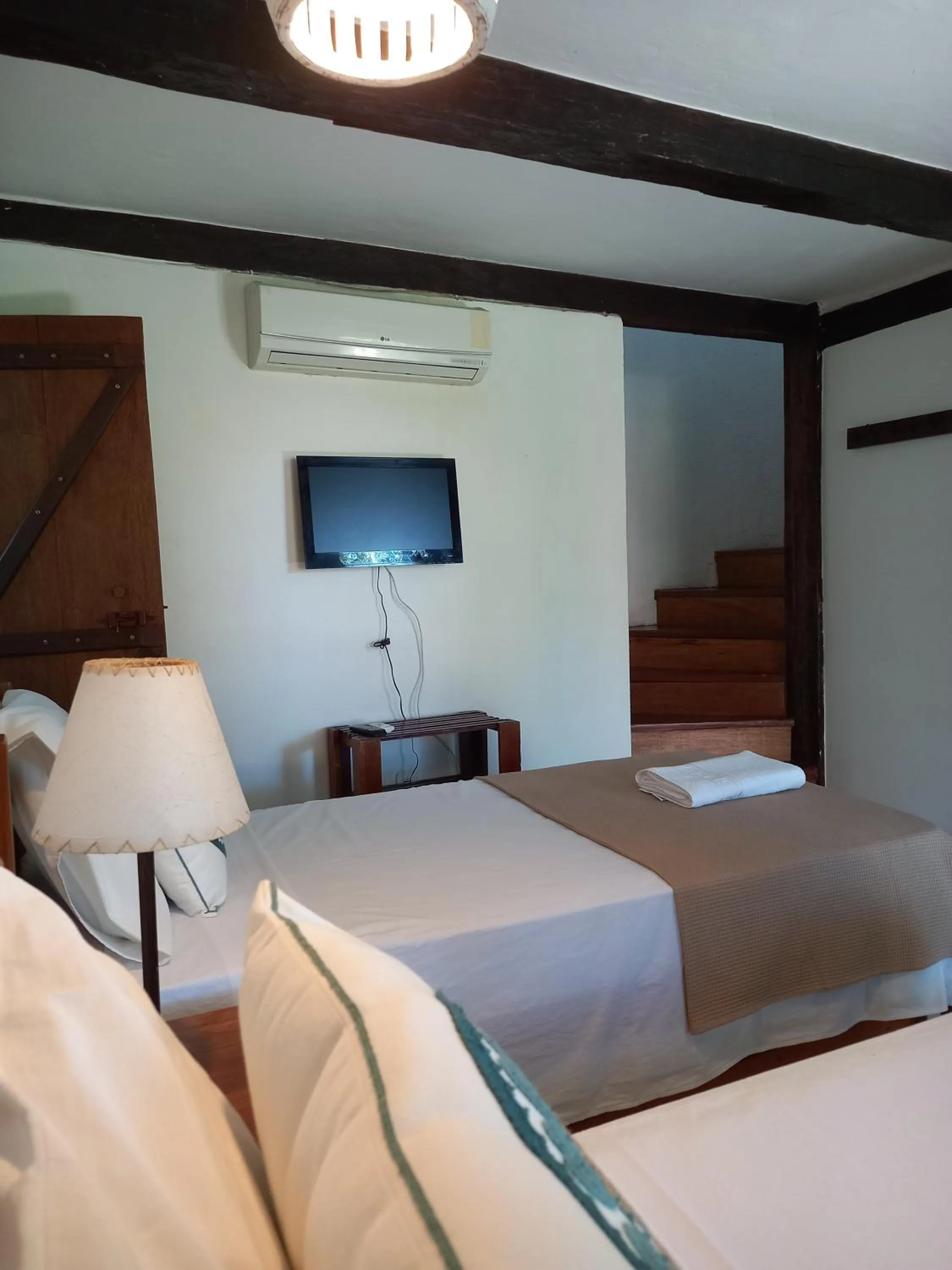 Bed in Pousada Atlântida