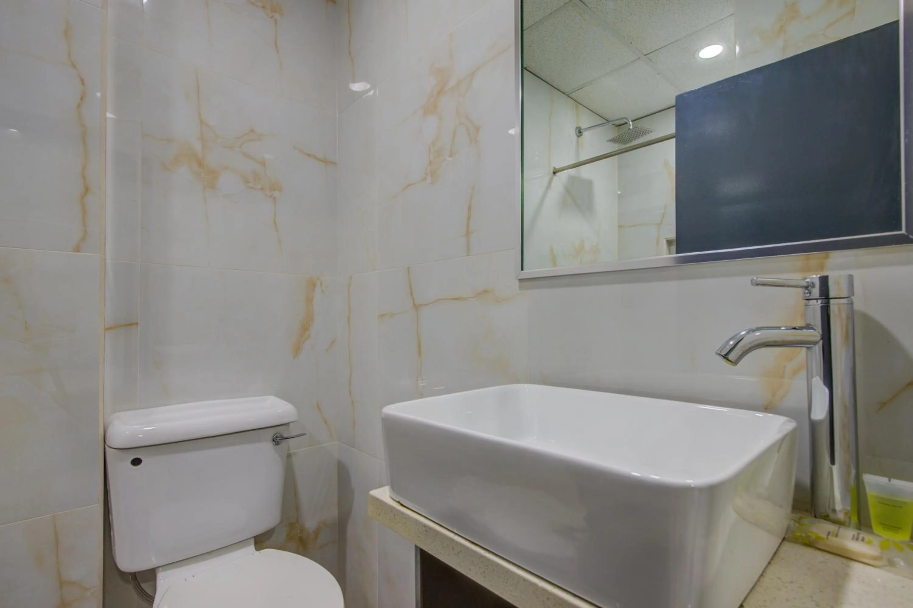 Bathroom in Airport Suites Hotel