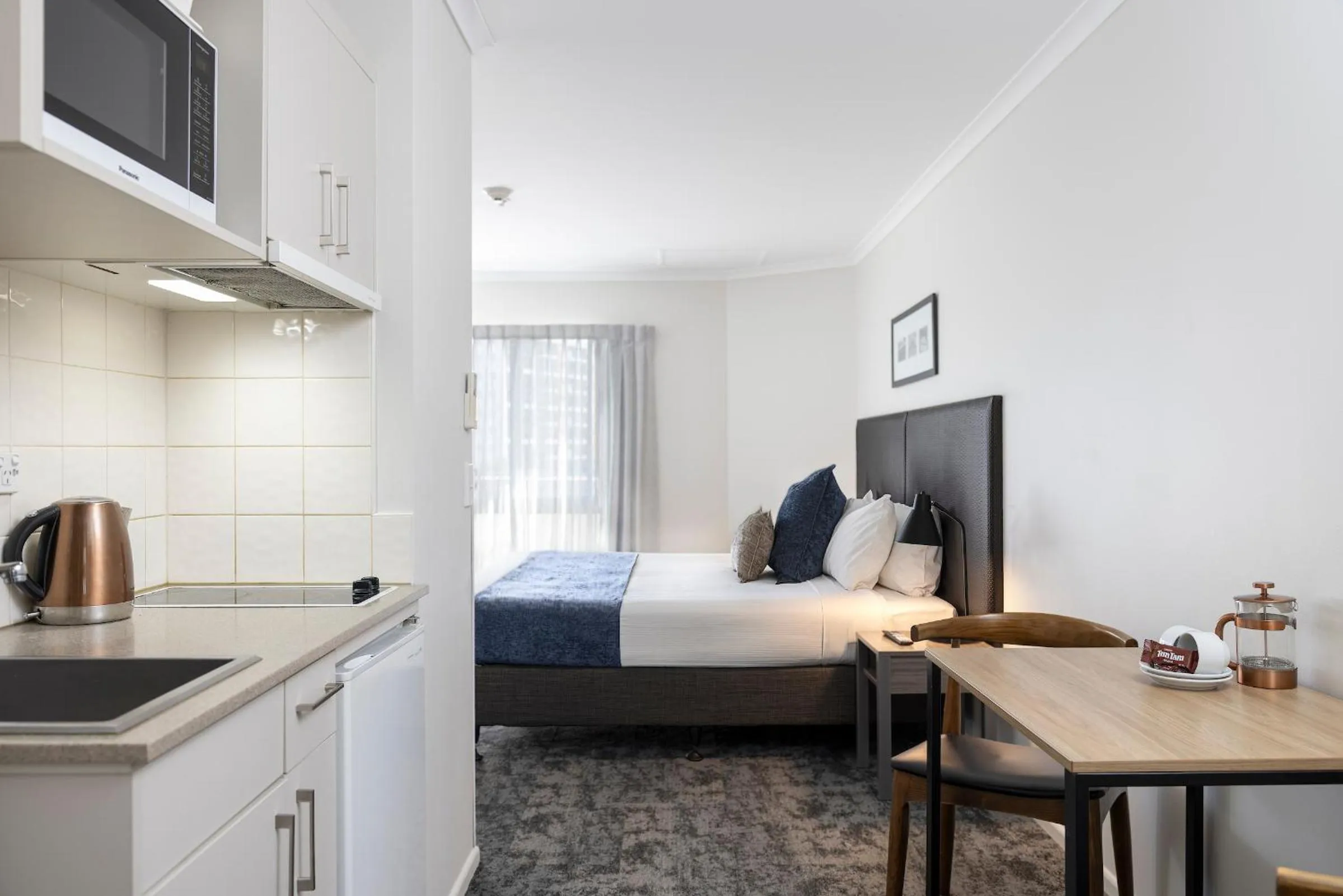 Bed in Quest Auckland Serviced Apartments