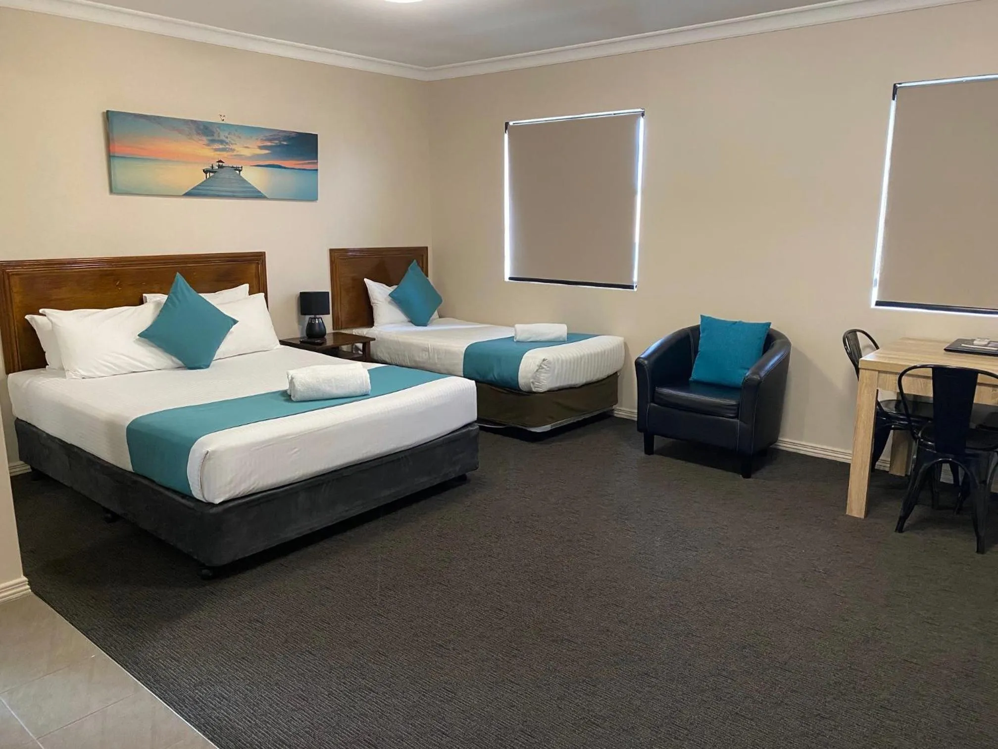 Bed in Cityville Apartments & Motel