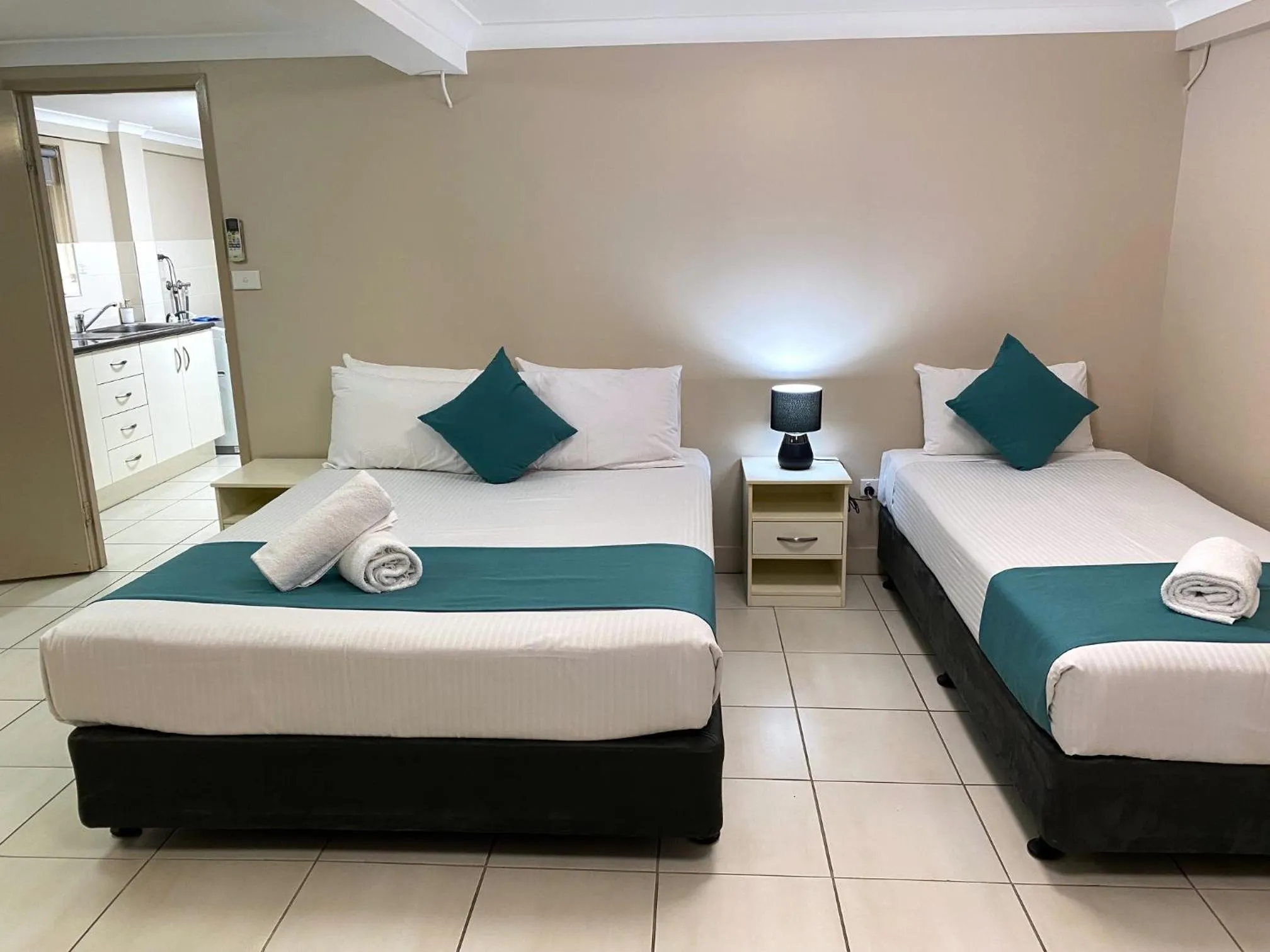 Bed in Cityville Apartments & Motel