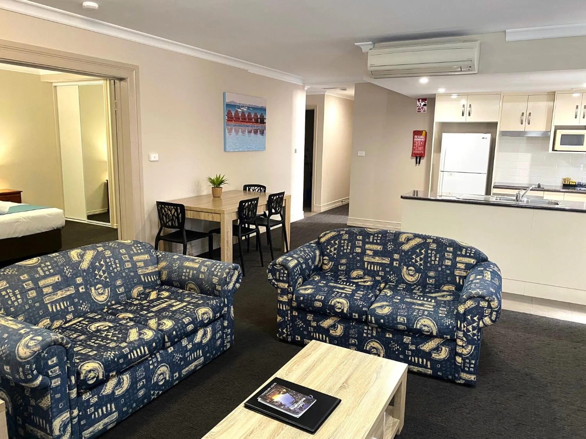 Bed in Cityville Apartments & Motel